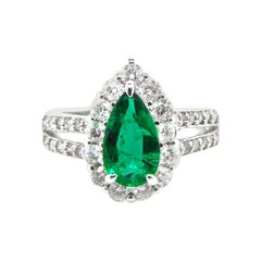 1.11 Carat Emerald and Diamond Cluster Ring Set in Platinum