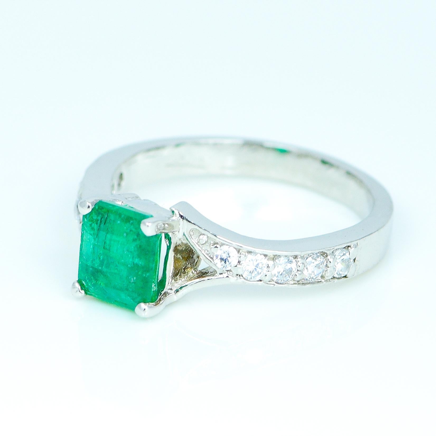 Beautiful designer ring made in silver with natural emerald and american diamonds (synthetic diamonds) and handcrafted with love. Emerald gemstone is believed to use for increasing the peace of mind and ability to learn.

Product Details:

Metal -