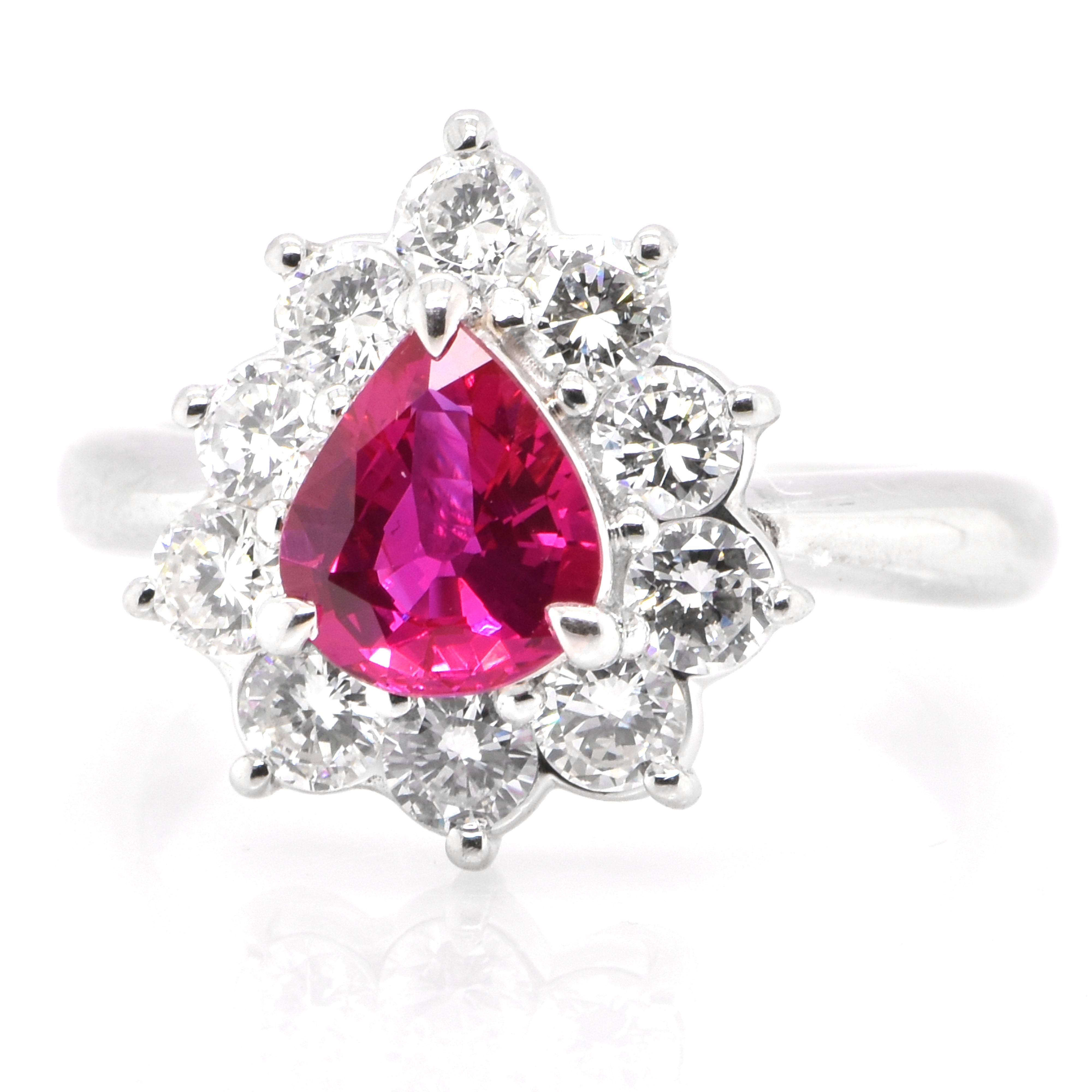 A beautiful ring set in Platinum featuring a 1.11 Carat Natural Pear Cut Ruby and 0.94 Carat Diamonds. Rubies are referred to as 