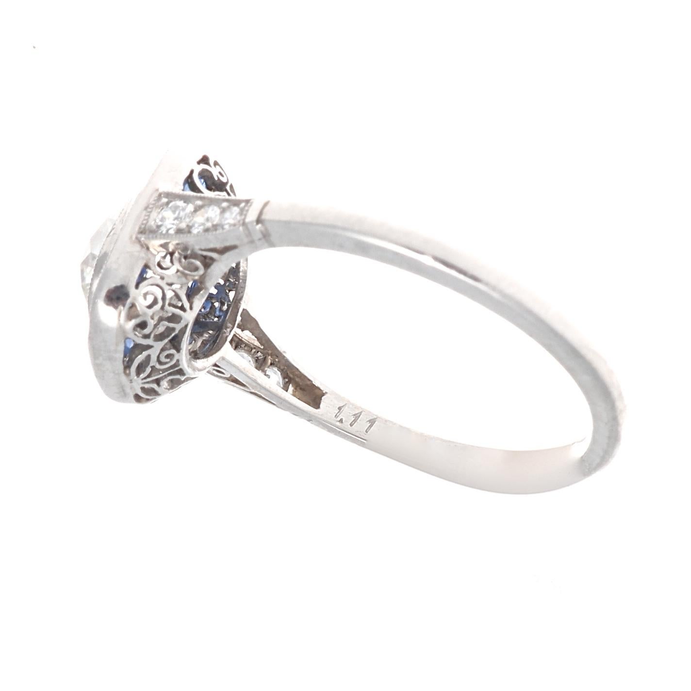 Art Deco 1+ Carat Diamond Platinum Engagement Ring With Calibré Cut Sapphire Halo