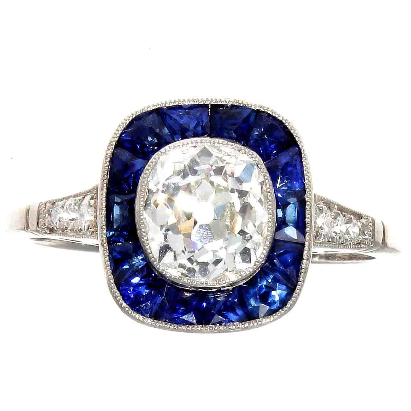 1+ Carat Diamond Platinum Engagement Ring With Calibré Cut Sapphire Halo