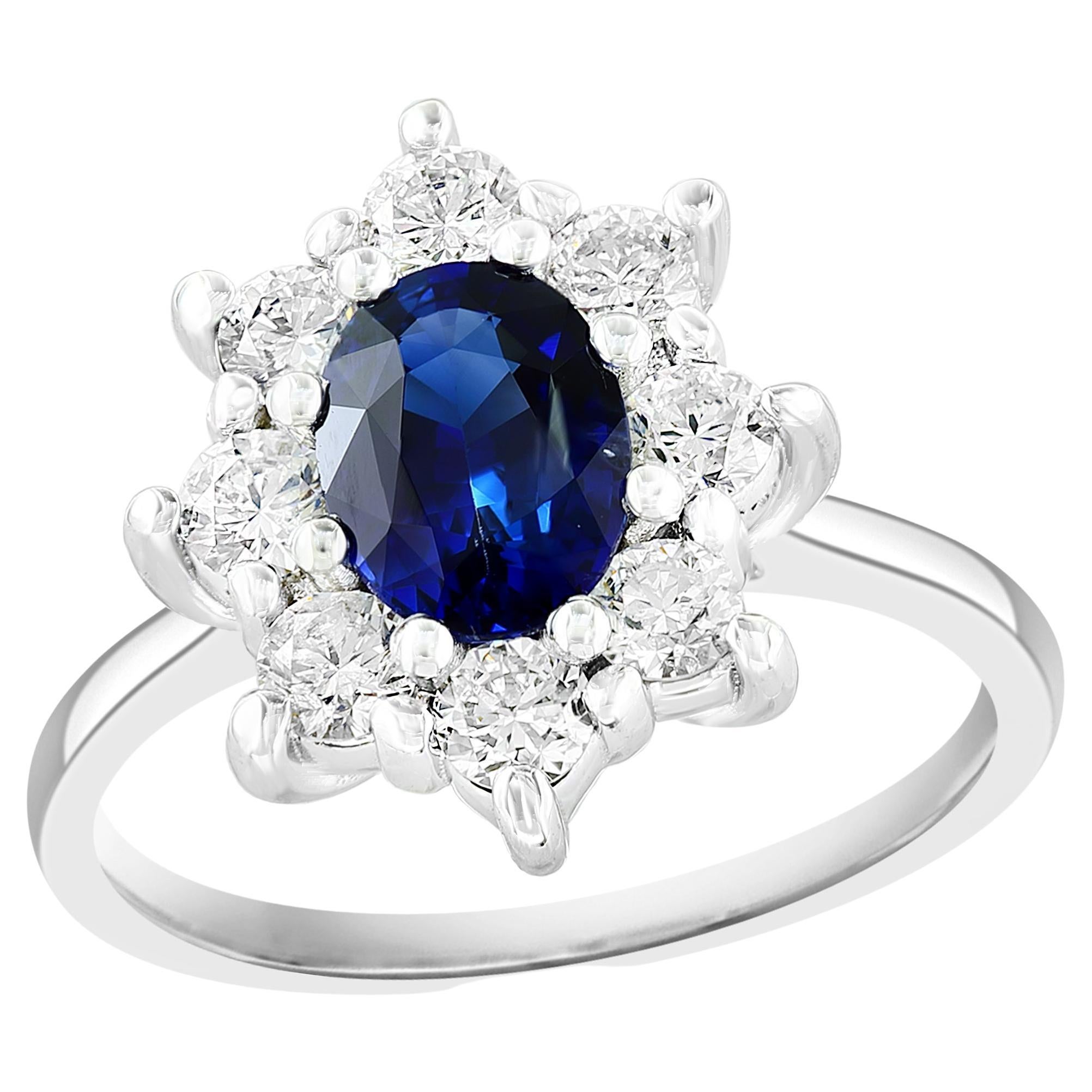 1.11 Carat Oval Cut Blue Sapphire and Diamond Ring in 14k White Gold For Sale