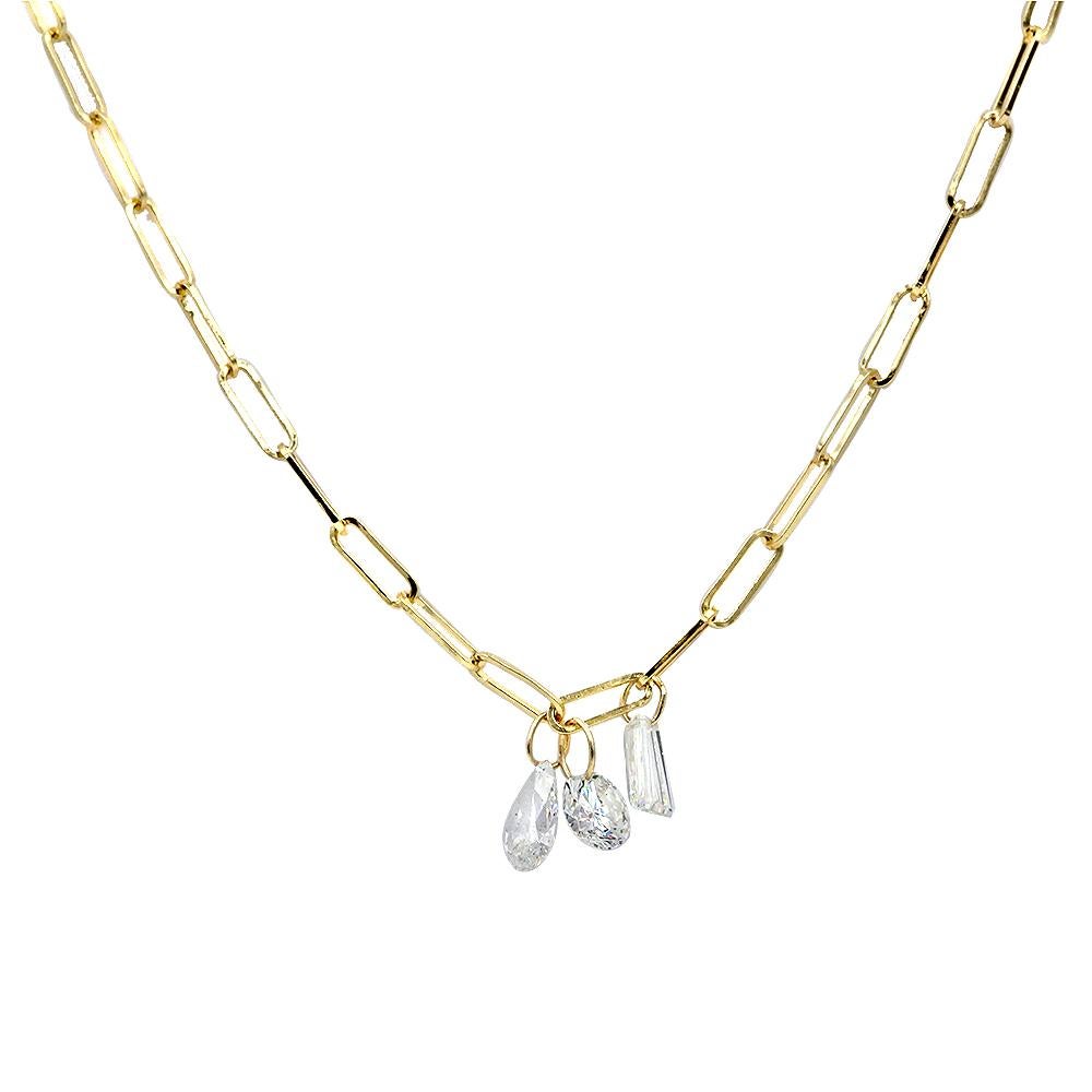 1.11 Carat Total Weight Floating Diamond Necklace or Pendant in 14k Yellow Gold. Diamond drop necklace contains 3 floating diamonds with 14k yellow link chain.
1 pear shape diamond 0.41ct .
1 round brilliant cut diamond 0.42ct . 
1 baguette 0.28ct.
