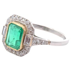 Vintage 1.11 carats colombian emerald ring with diamonds
