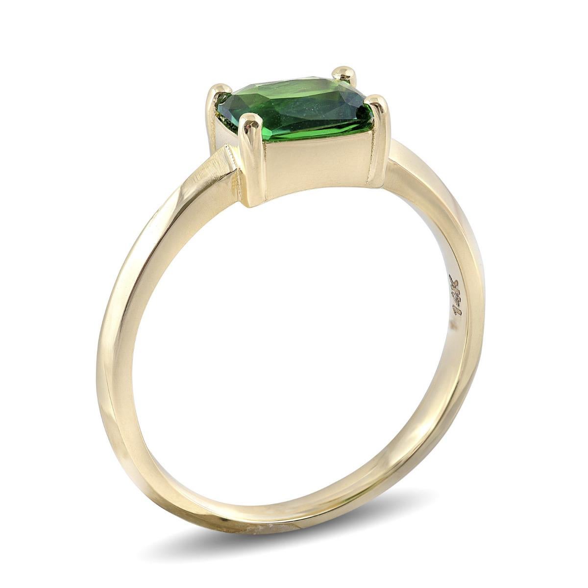 This spring colored Tsavorite is as spectacular as this gem gets. Cut as an octagon, weighing 1.11 carats, it rests perfectly on the finger. Prong set, in 14K yellow gold; this ring is great to have when popping the big question.

Ring