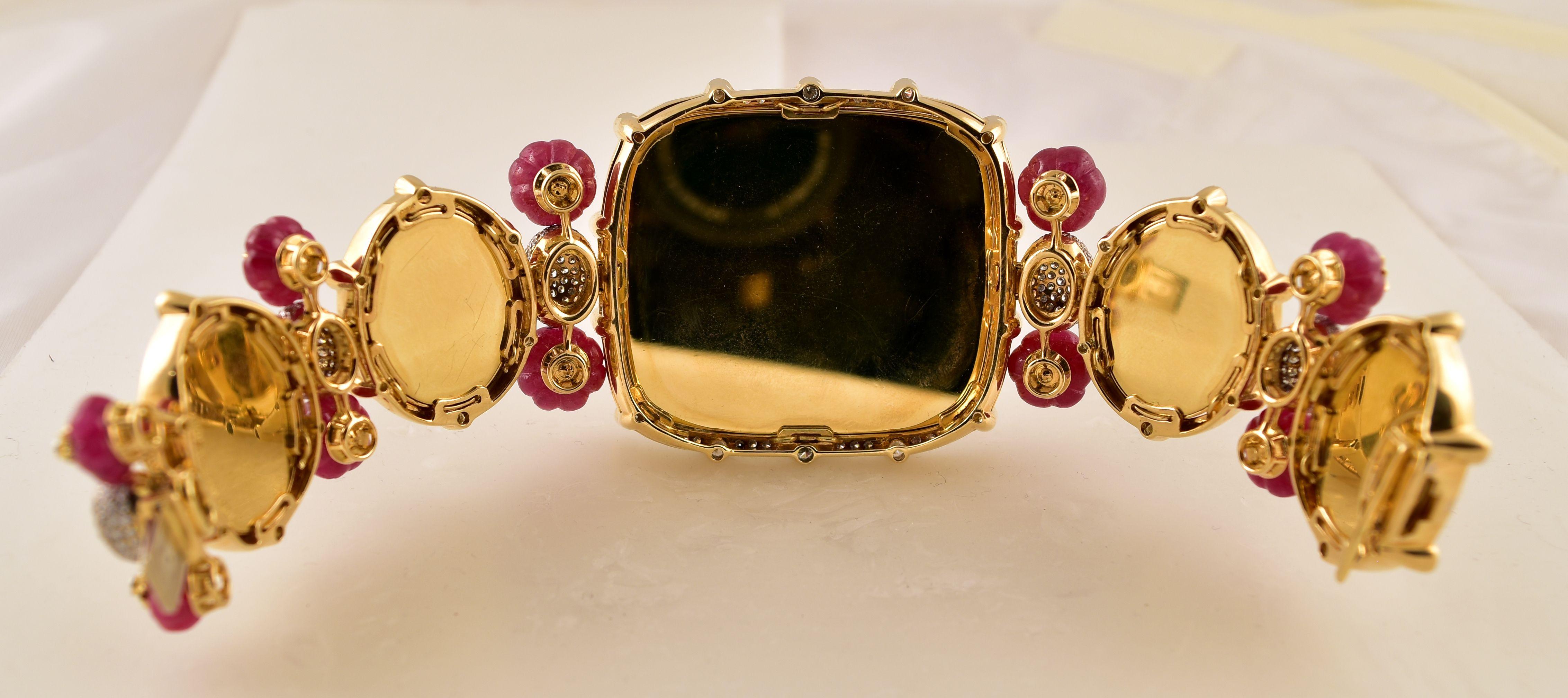 Magnificent! Elegant and Finely detailed 19th Century Hand painted Plaques featuring Indian Monuments, Diamond (app. 11.10 total Carat weight) and Fluted Ruby beads (app. 97.4 total Carat weight) Statement Bracelet. Hand crafted in 18k yellow Gold;