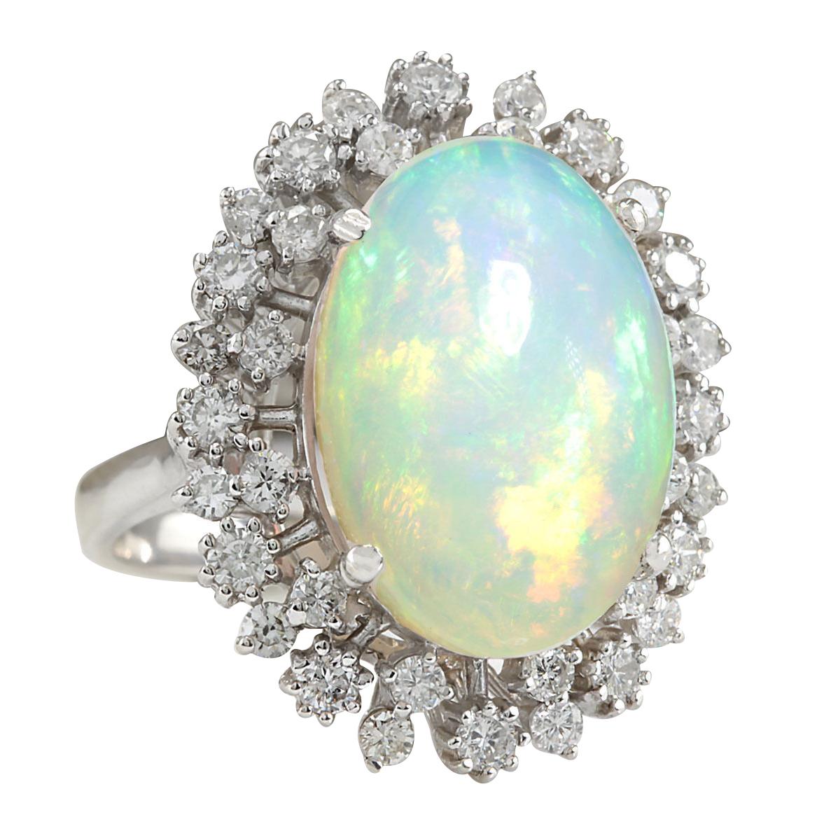 11.10 Carat Natural Opal 14 Karat White Gold Diamond Ring
Stamped: 14K White Gold
Total Ring Weight: 8.5 Grams
Total Natural Opal Weight is 9.85 Carat (Measures: 18.00x13.00 mm)
Color: Multicolor
Total Natural Diamond Weight is 1.25 Carat
Quantity:
