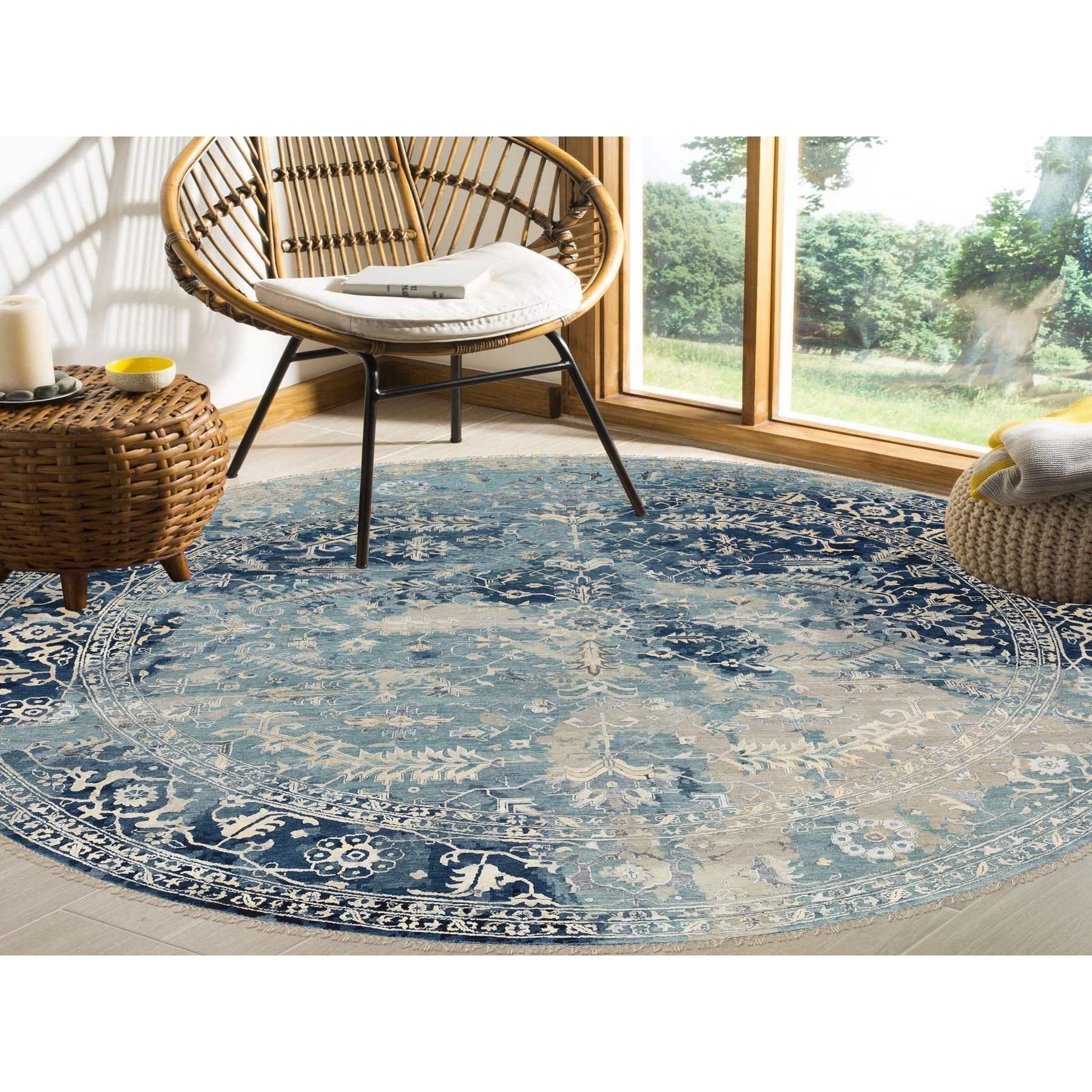 This is a truly genuine one-of-a-kind Navy Blue, Broken Persian Heriz Erased Design Wool and Silk, Hand Knotted, Round Oriental Rug. It has been Knotted for months and months in the centuries-old weaving craftsmanship techniques by expert