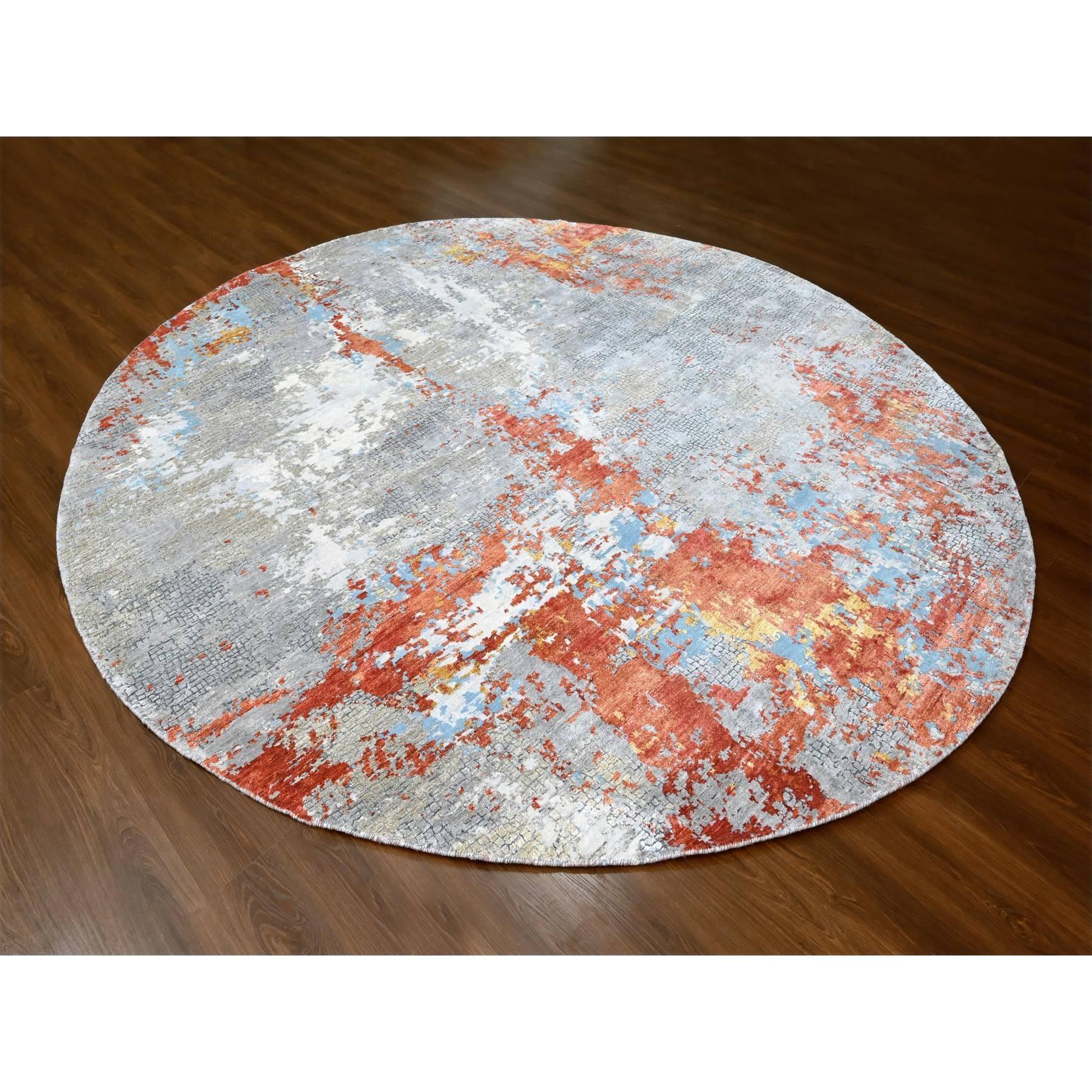 Rust Orange with Medium Gray, Hand Knotted, Abstract with Fire Mosaic Design, Wool and Silk, Round, Oriental Rug
Primary materials: Wool & Silk
Latex: No Pile 
height: 0.25 Inches
Style: Contemporary
Primary color: Orange
Secondary colors: Yellow,