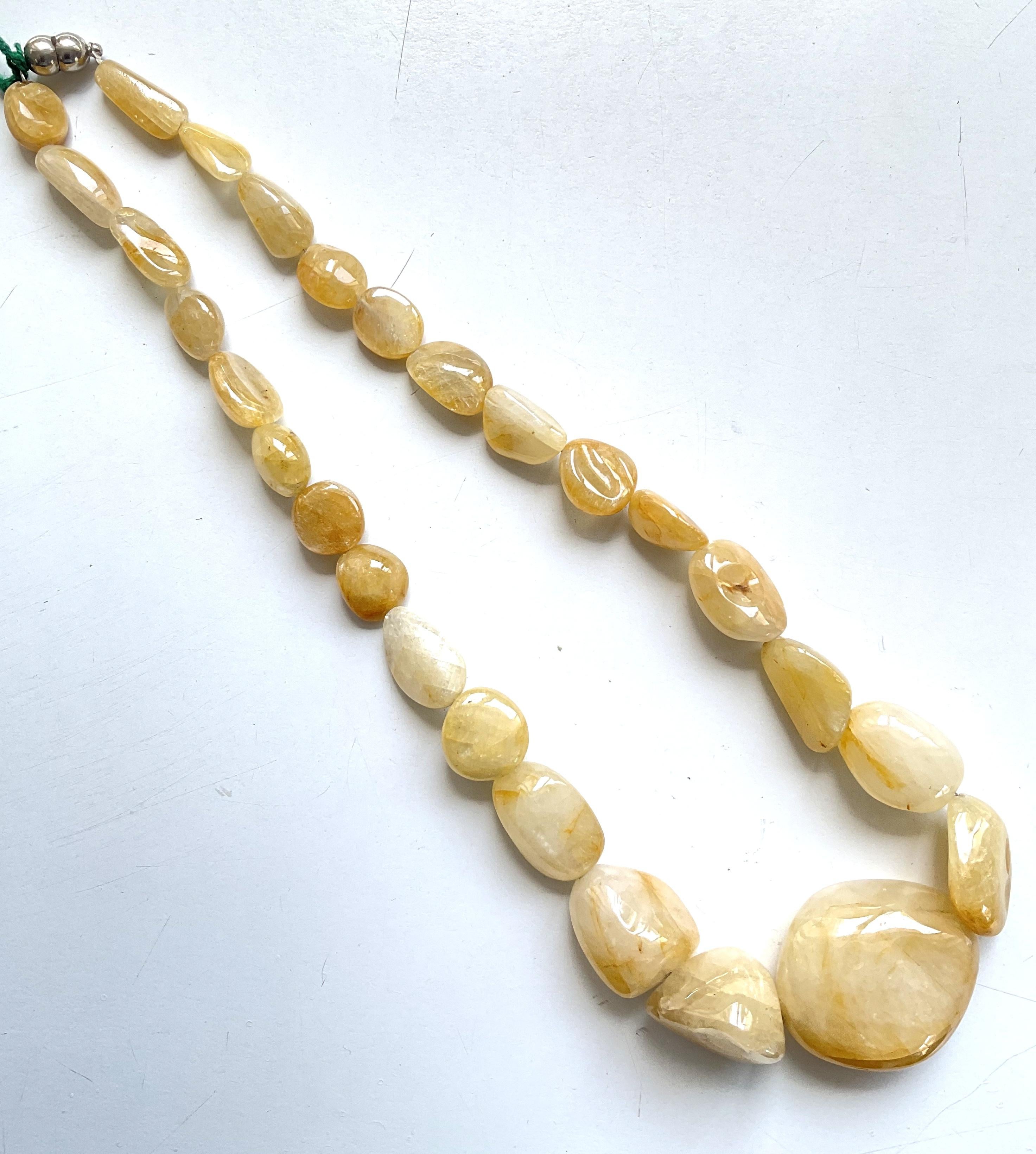 1111.20 Carats Big Size Yellow Sapphire Plain Tumbled Natural Gemstone Necklace

Gemstone - Sapphire
Weight -  1111.20 carats 
Shape - Tumbled
Size - 12x14 To 42x35 MM
Quantity - 1 line
