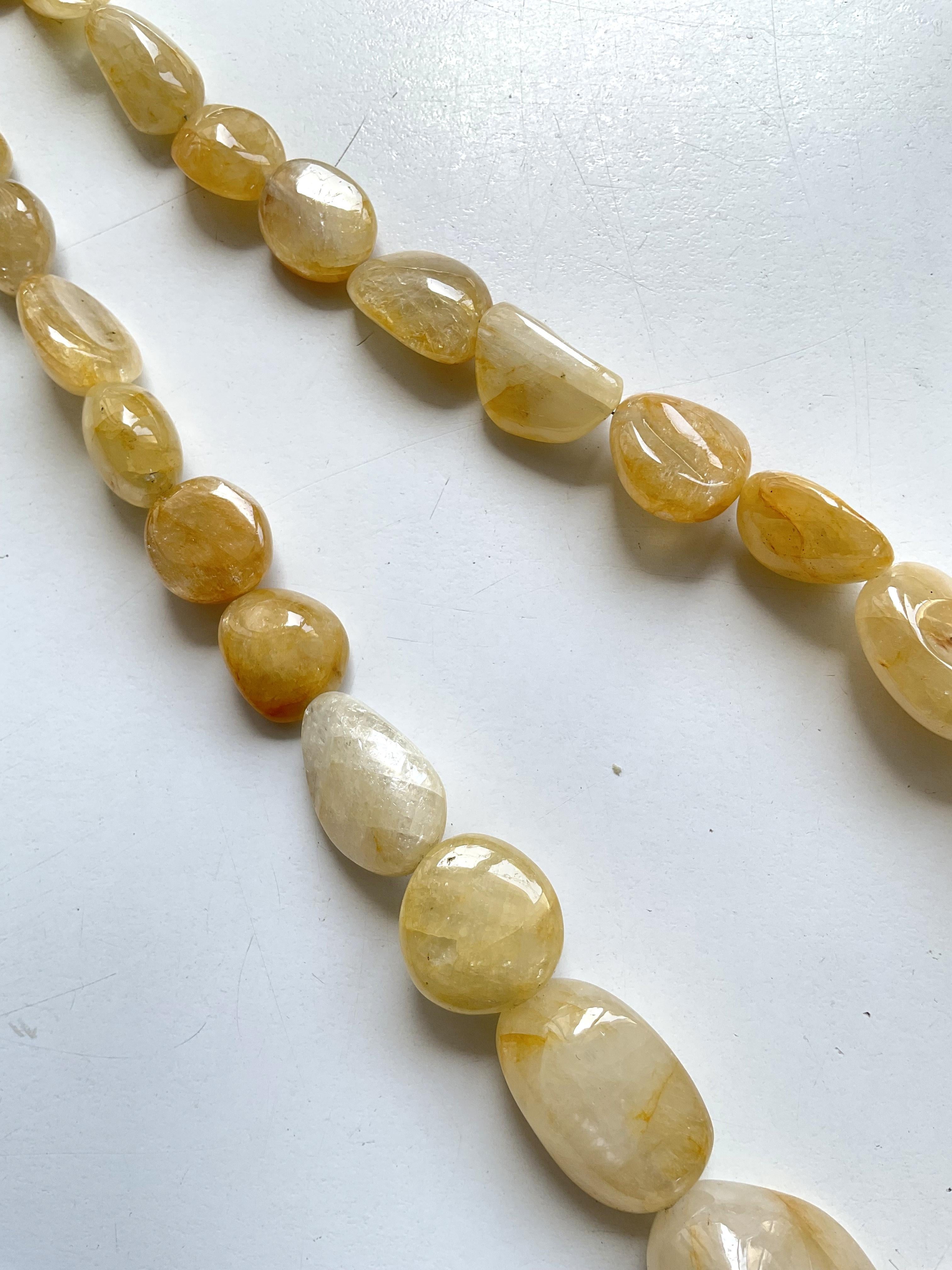 1111.20 Carats Big Size Yellow Sapphire Plain Tumbled Natural Gemstone Necklace In New Condition For Sale In Jaipur, RJ