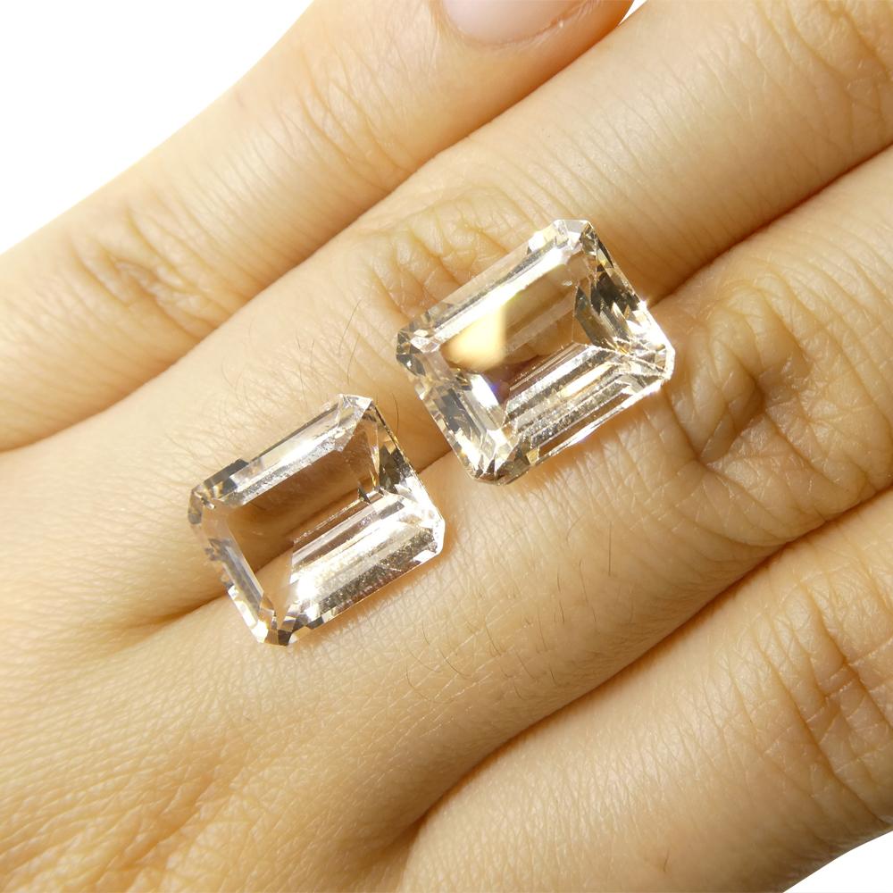 Description:

Gem Type: Morganite 
Number of Stones: 2
Weight: 11.11 cts
Measurements: 12.00 x 10.00 x 6.00  mm
Shape: Emerald Cut
Cutting Style Crown: Step Cut
Cutting Style Pavilion: Step Cut 
Transparency: Transparent
Clarity: Very Slightly