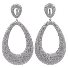 Pendientes de aro ovalados con diamantes de fantasía de 11⅓ct en oro de 18k