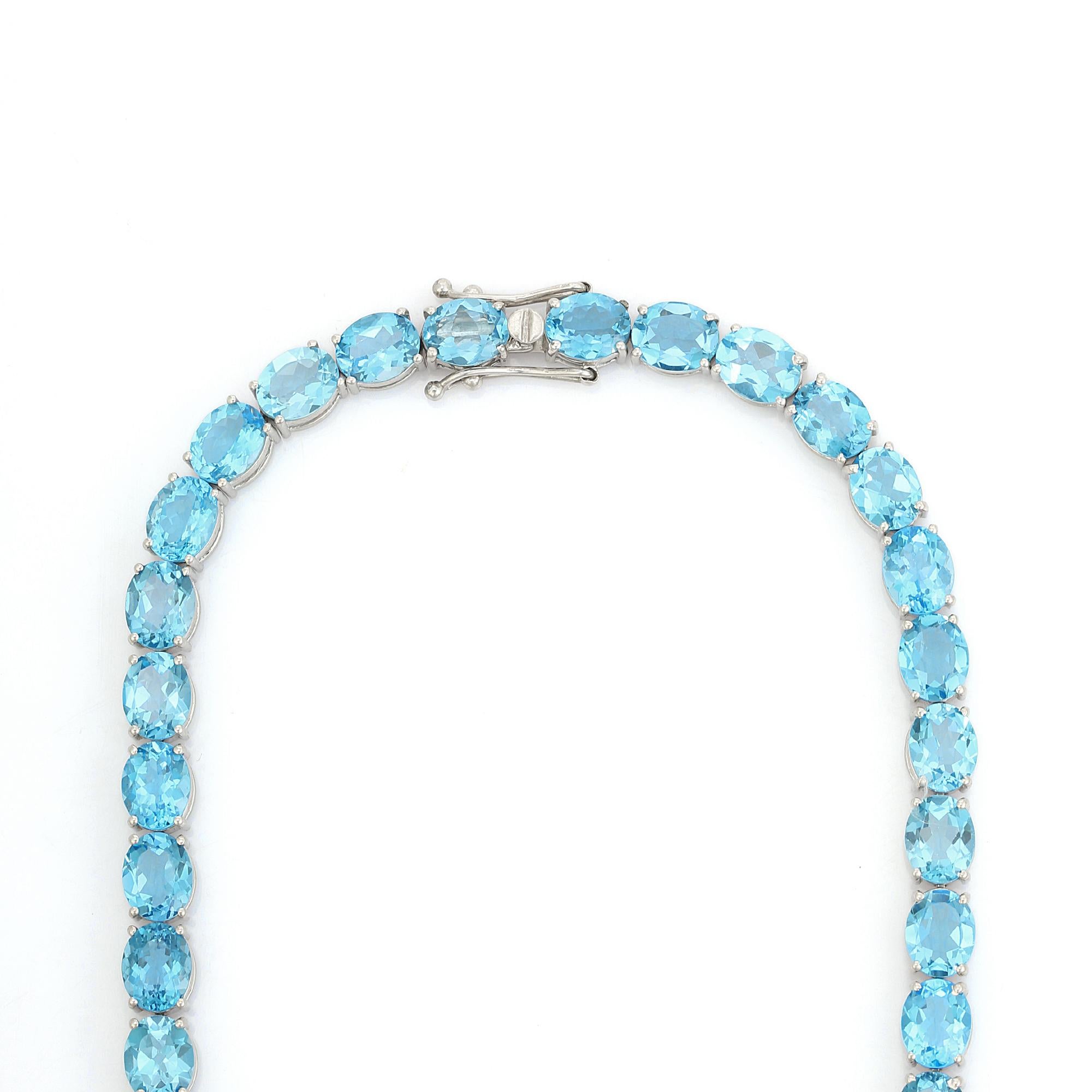 Modernist 111.46 Carat Faceted Oval Cut Blue Topaz Tennis Necklace in 925 Sterling Silver For Sale