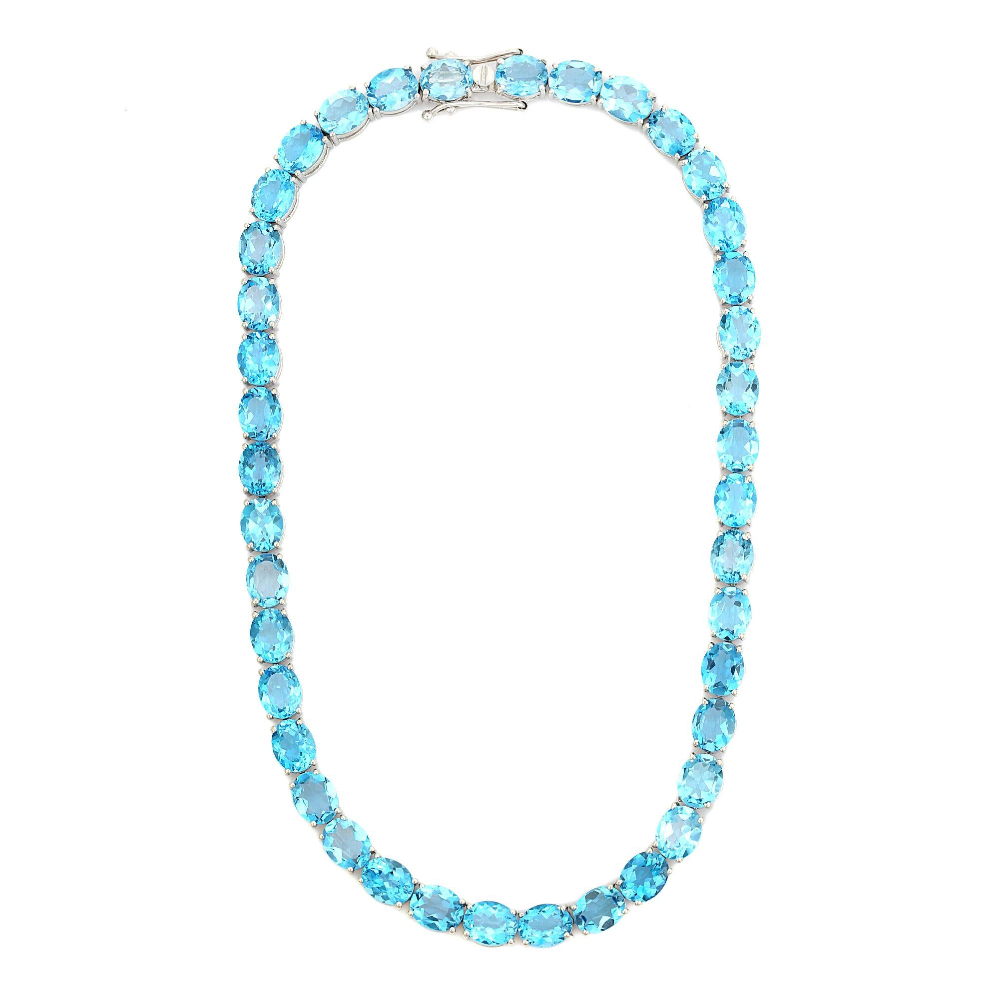 Women's 111.46 Carat Faceted Oval Cut Blue Topaz Tennis Necklace in 925 Sterling Silver For Sale