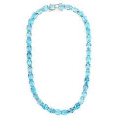 111.46 Carat Faceted Oval Cut Blue Topaz Tennis Necklace in 925 Sterling Silver
