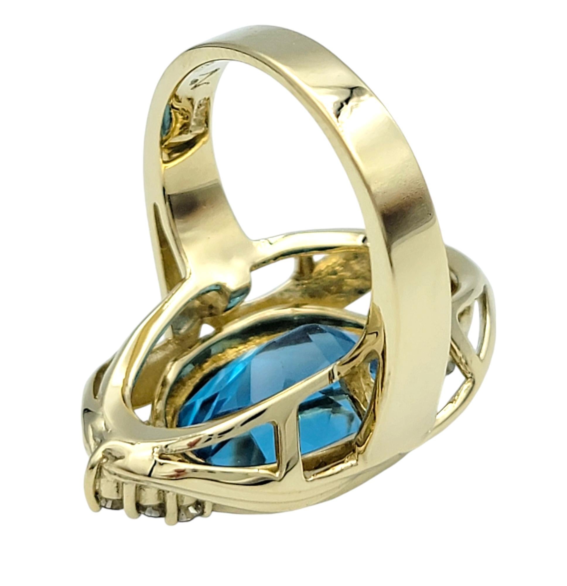 Round Cut 11.15 Carat Oval Cut Swiss Blue Topaz and Diamond 14 Karat Gold Cocktail Ring For Sale