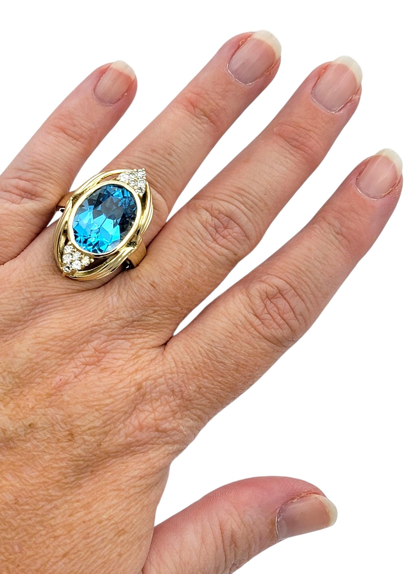 Women's 11.15 Carat Oval Cut Swiss Blue Topaz and Diamond 14 Karat Gold Cocktail Ring For Sale