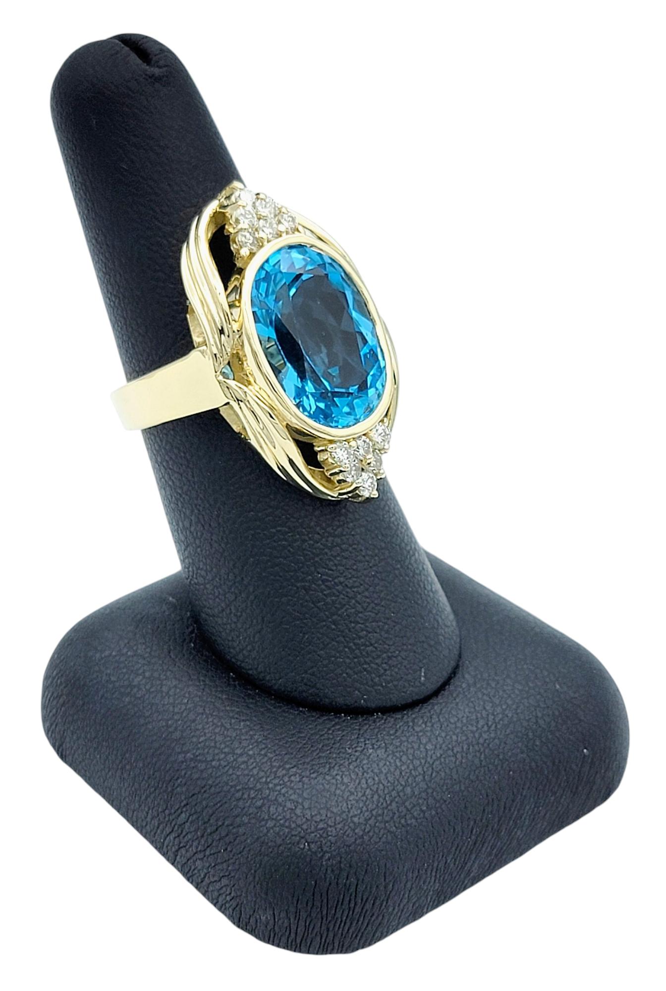 11.15 Carat Oval Cut Swiss Blue Topaz and Diamond 14 Karat Gold Cocktail Ring For Sale 2