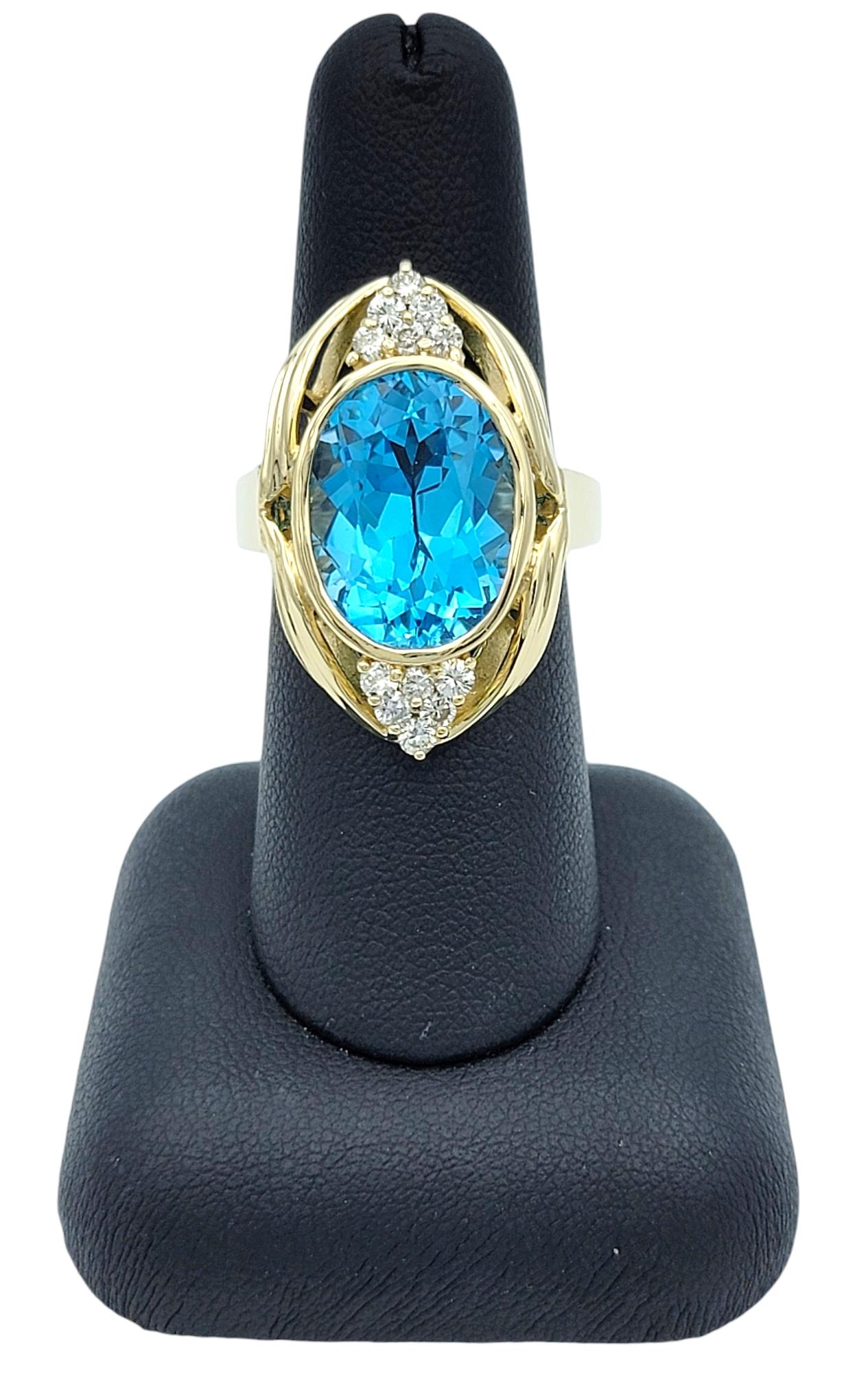 11.15 Carat Oval Cut Swiss Blue Topaz and Diamond 14 Karat Gold Cocktail Ring For Sale 3