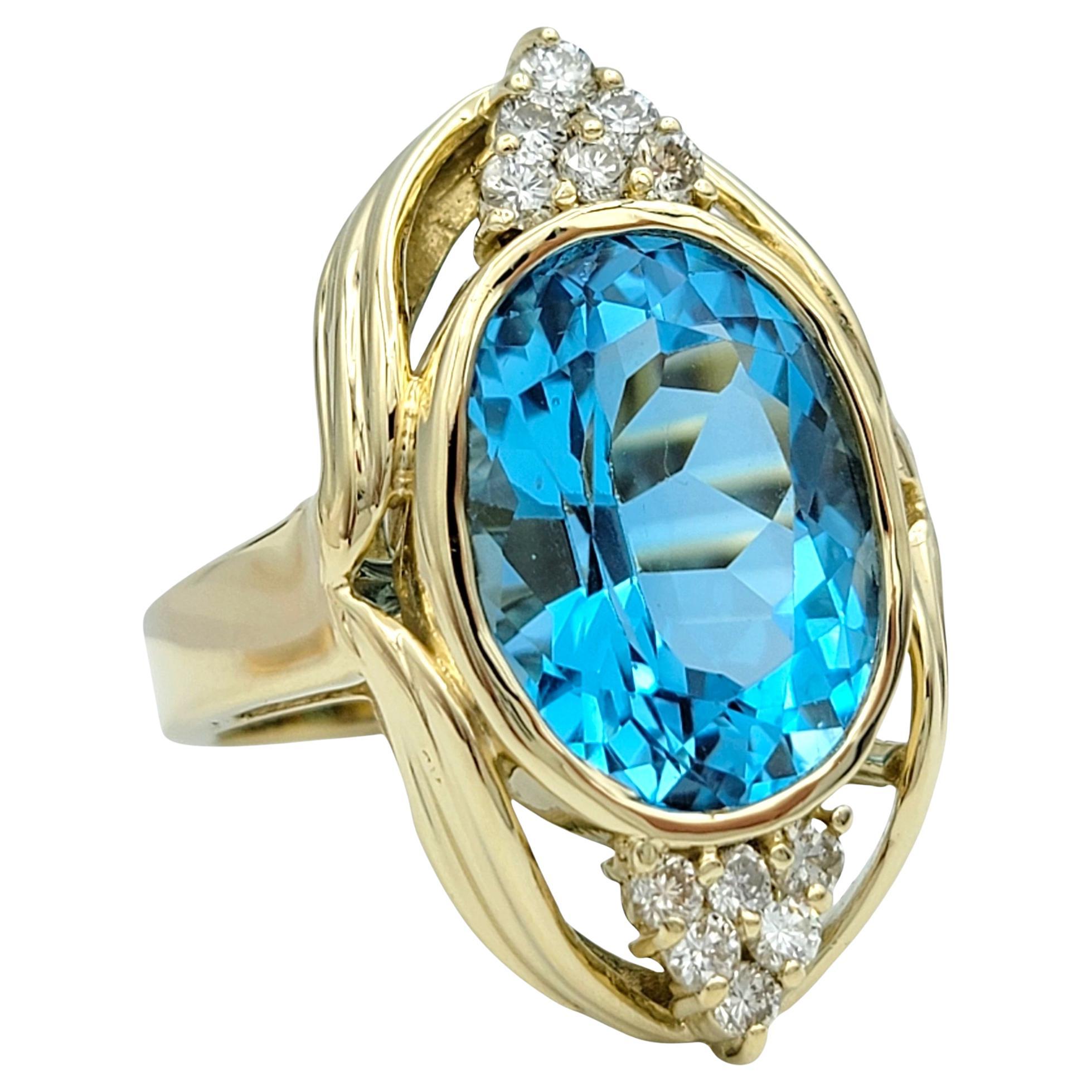 11.15 Carat Oval Cut Swiss Blue Topaz and Diamond 14 Karat Gold Cocktail Ring For Sale