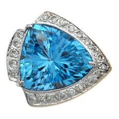 11.15 Carat Trillion Cut Blue Topaz Cocktail Ring with Diamonds in 14 Karat Gold
