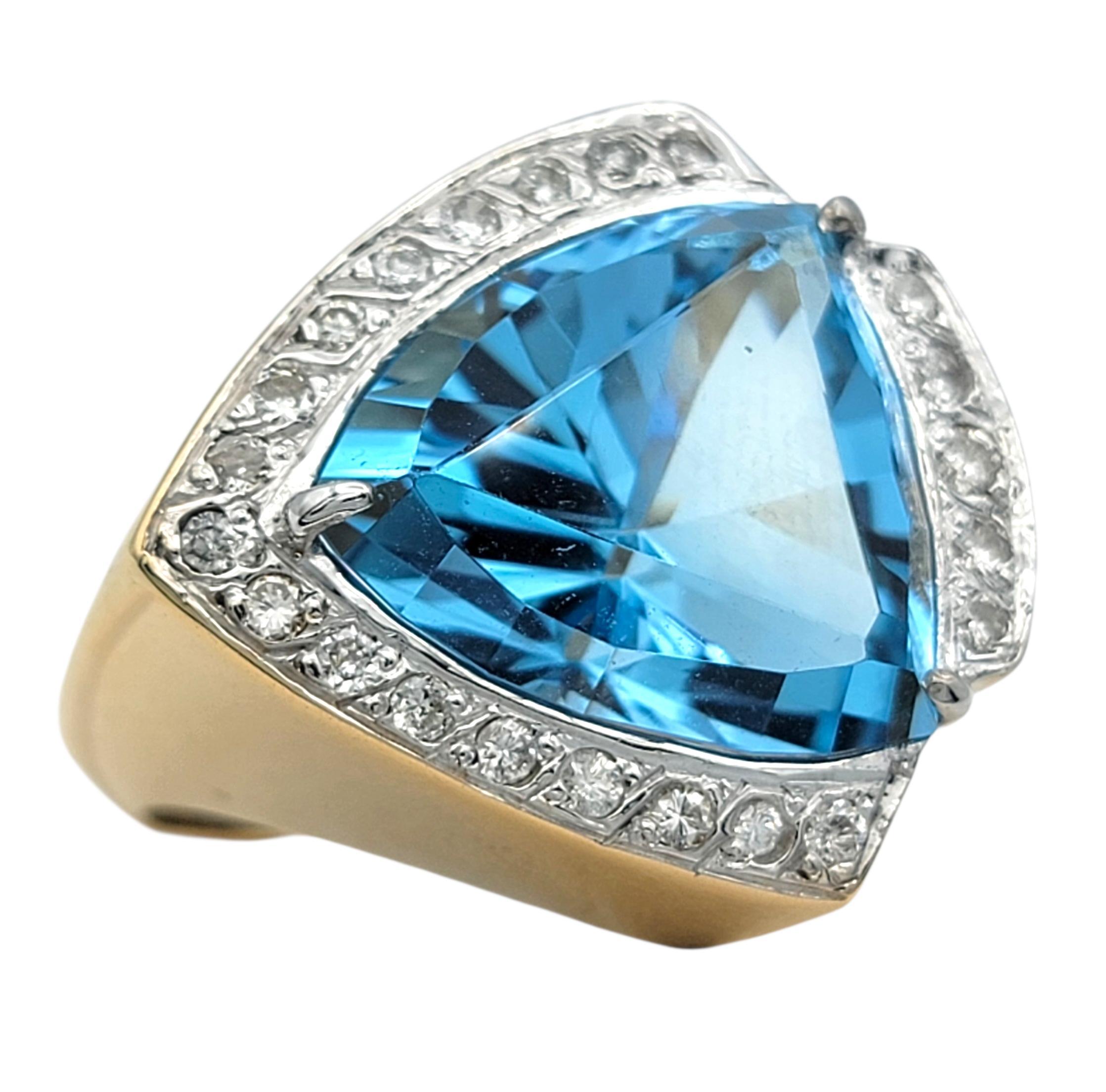 Contemporary 11.15 Carat Trillion Cut Blue Topaz Cocktail Ring with Diamonds in 14 Karat Gold For Sale