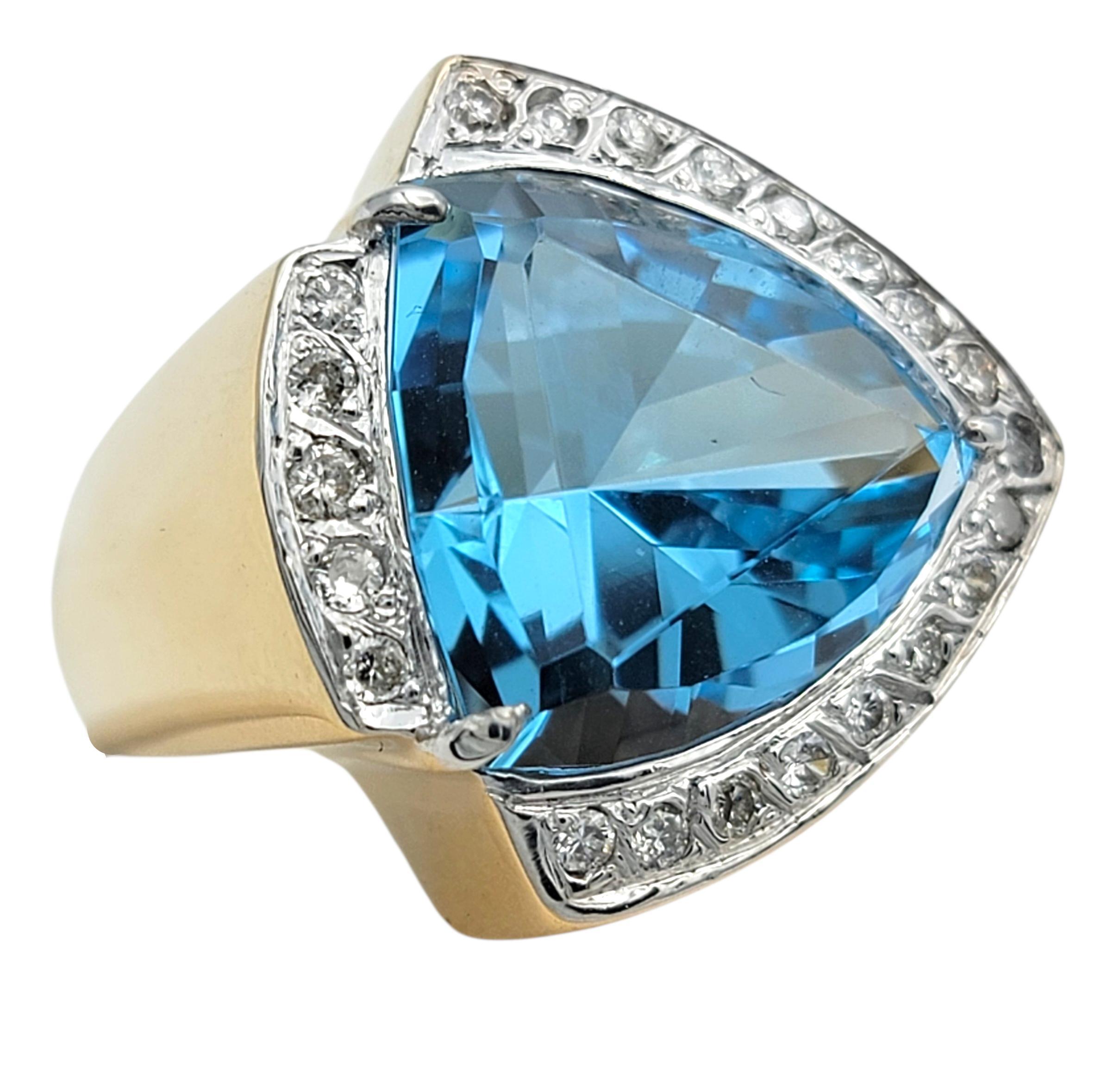 Women's 11.15 Carat Trillion Cut Blue Topaz Cocktail Ring with Diamonds in 14 Karat Gold For Sale