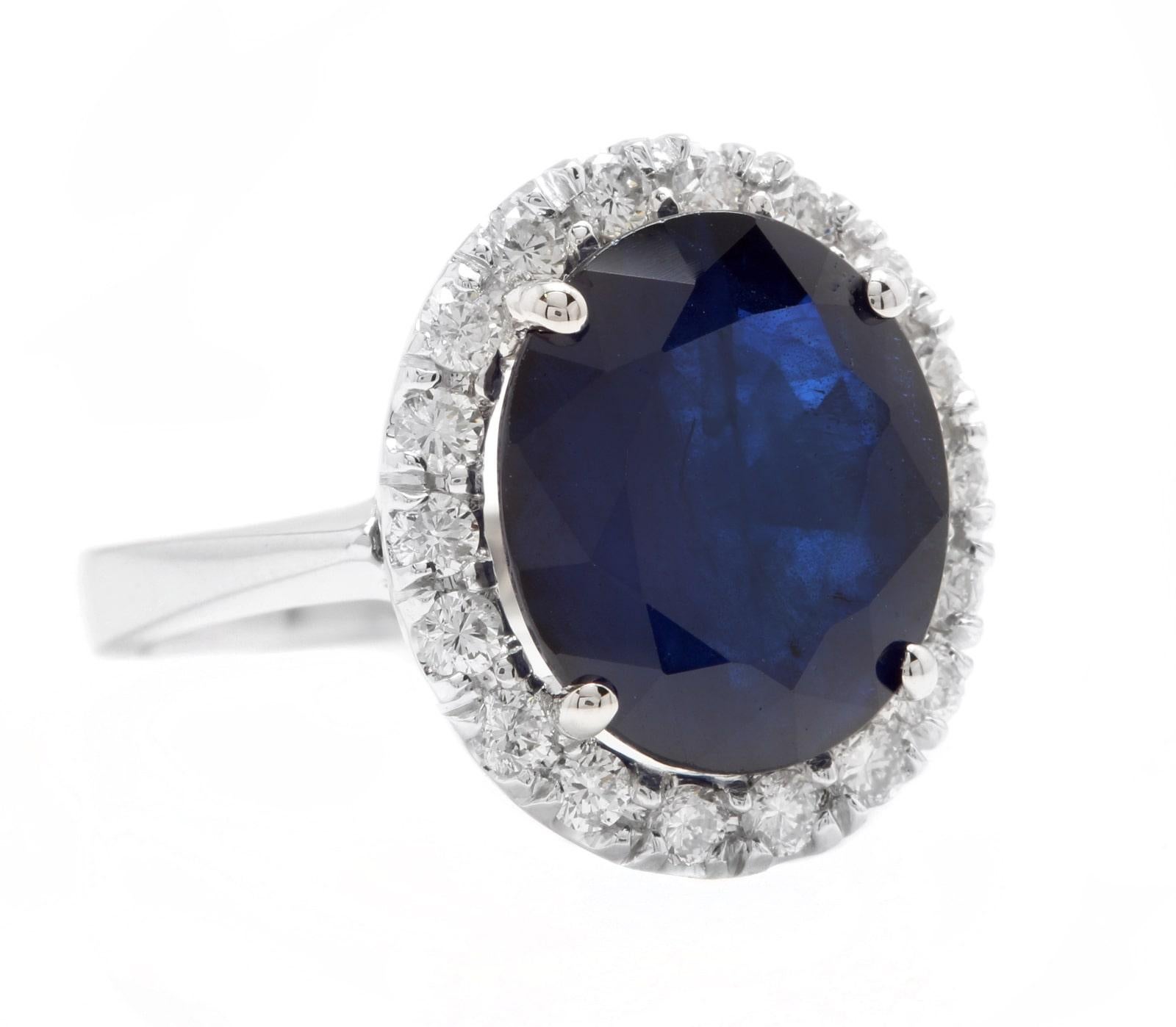 11.15 Carats Exquisite Natural Blue Sapphire and Diamond 14K Solid White Gold Ring

Suggested Replacement Value Approx. $6,500.00

Total Blue Sapphire Weight is: Approx. 10.00 Carats 

Sapphire Measures: Approx. 14.00 x 12.00mm

Sapphire Treatment: