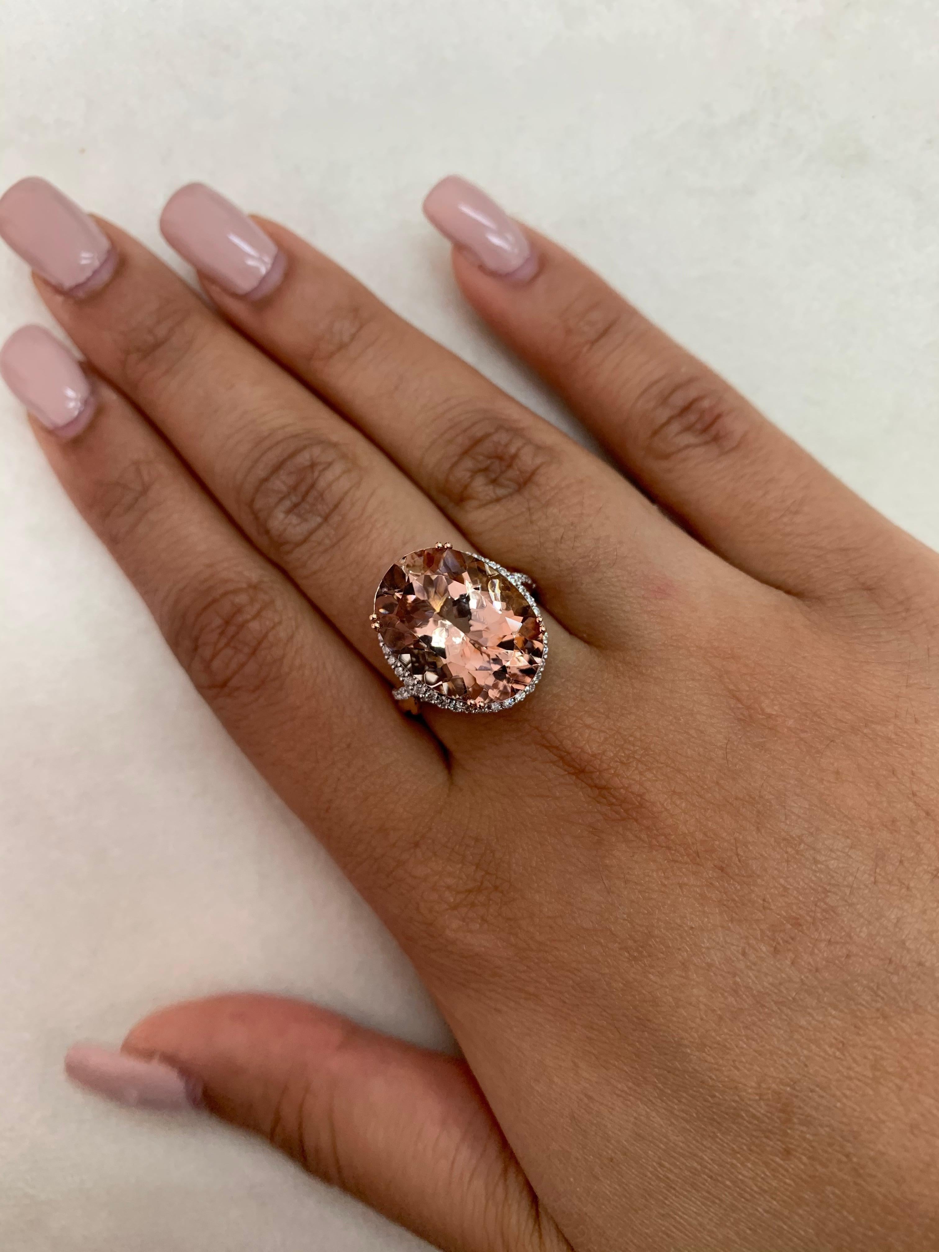 Women's 11.17 Carat Oval Shaped Morganite Ring in 18 Karat Rose Gold with Diamonds For Sale