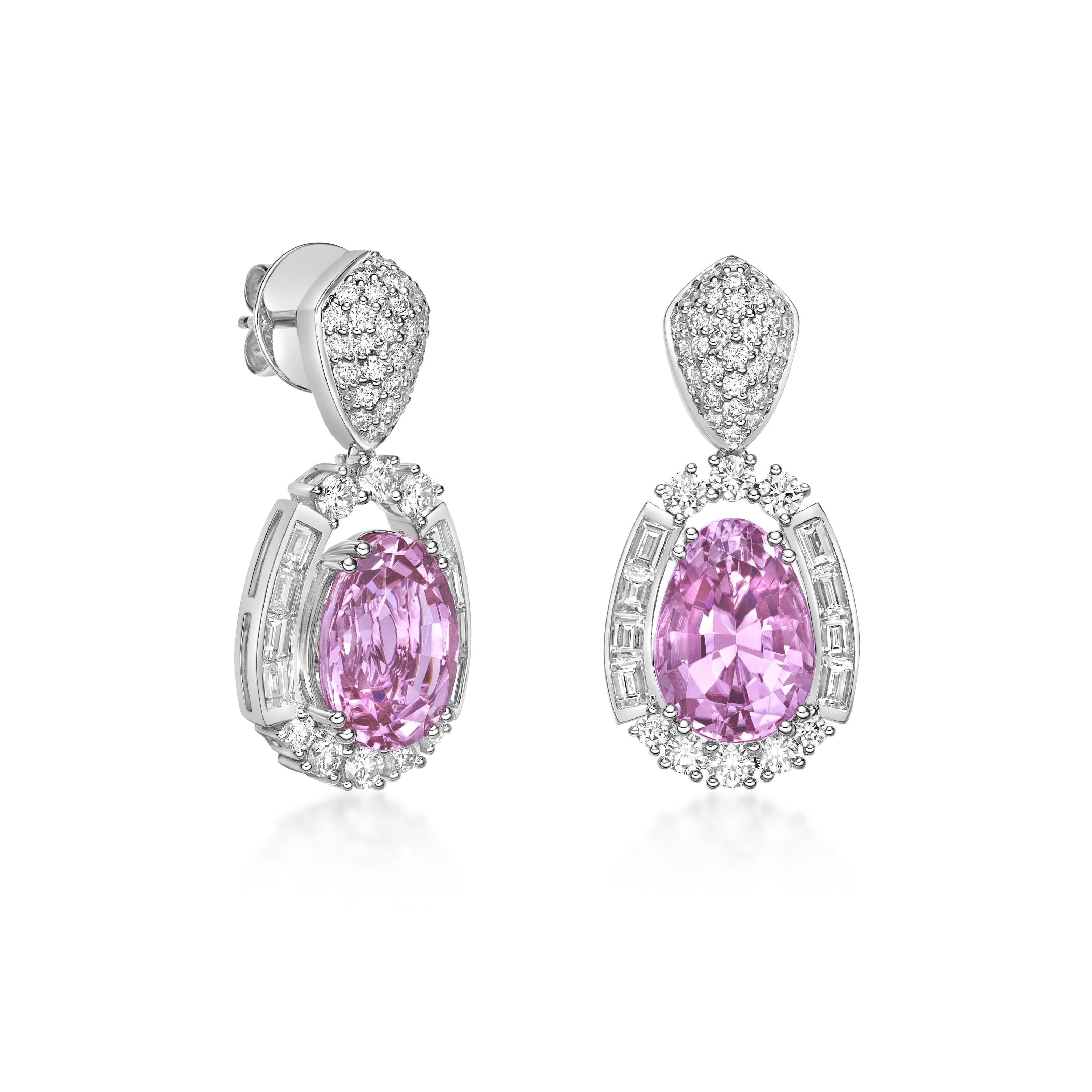 This collection features an array of Pink Tourmaline with a Pink hue that is as cool as it gets! Accented with diamonds these earrings are made in white gold and present a classic yet elegant look.. 

Pink Tourmaline Drop Earrings in 18 Karat White