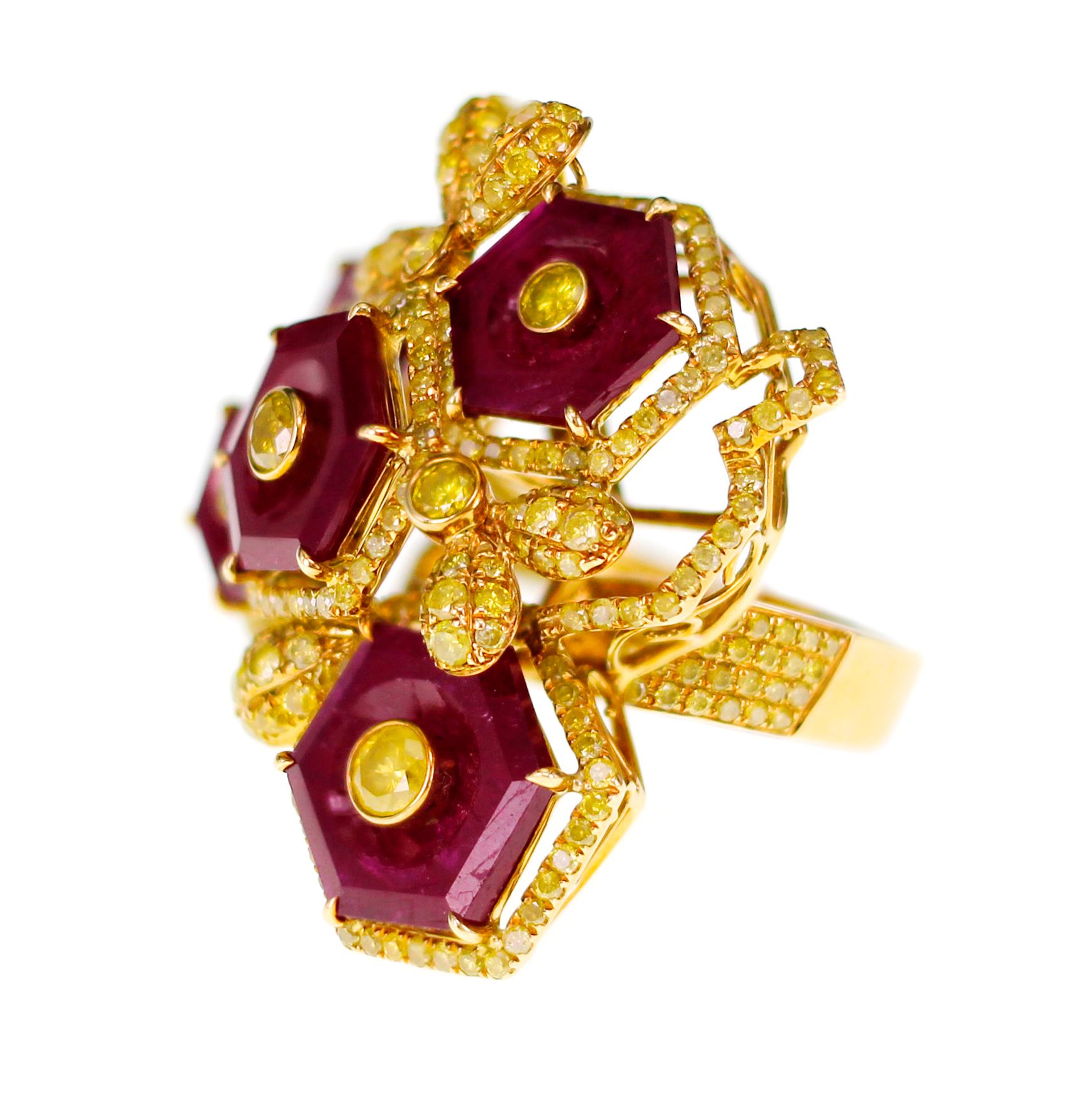5 specially cut hexagon vivid red ruby are featuring with 2.78 carat of natural vivid yellow diamond in an absolutely stunning ring. Own it to feel it ! 