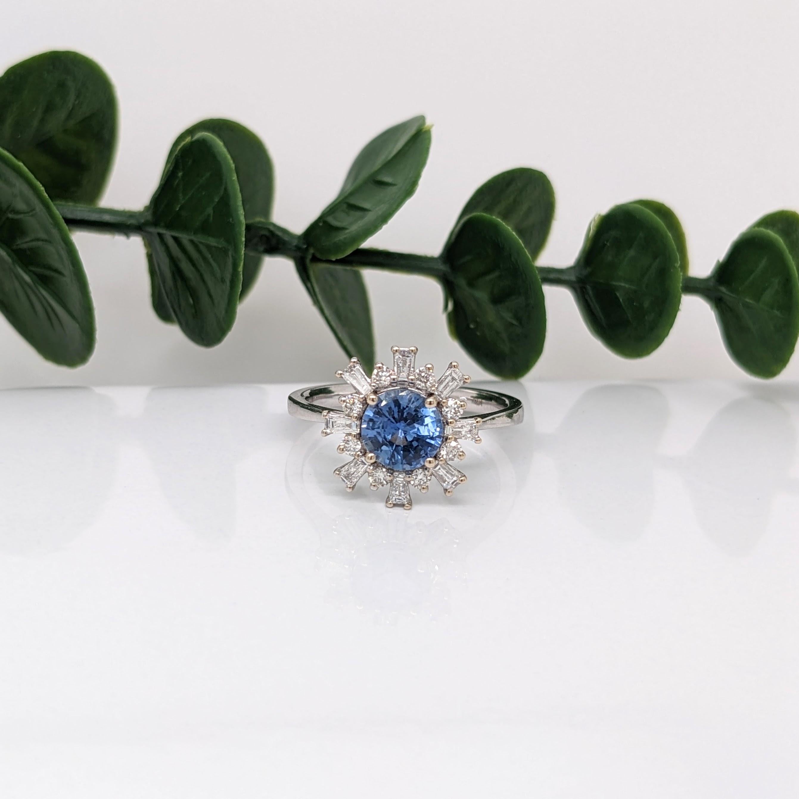 This sparkling white and blue ring is perfect for the modern bride or for 5th and 45th anniversaries! It is also a great statement piece for the holidays coming up. with it's snowflake inspired halo! With a tapered band you can ensure that this ring