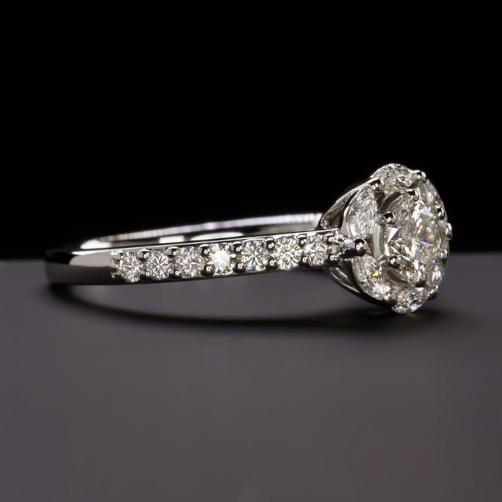 Gorgeous engagement ring featuring a brilliant white, fully clean celebrity cut diamond of 0.50 ct in a very elegant design. The celebrity cut, also known as the radiant star cut, is a unique diamond facet pattern that uses additional facets to