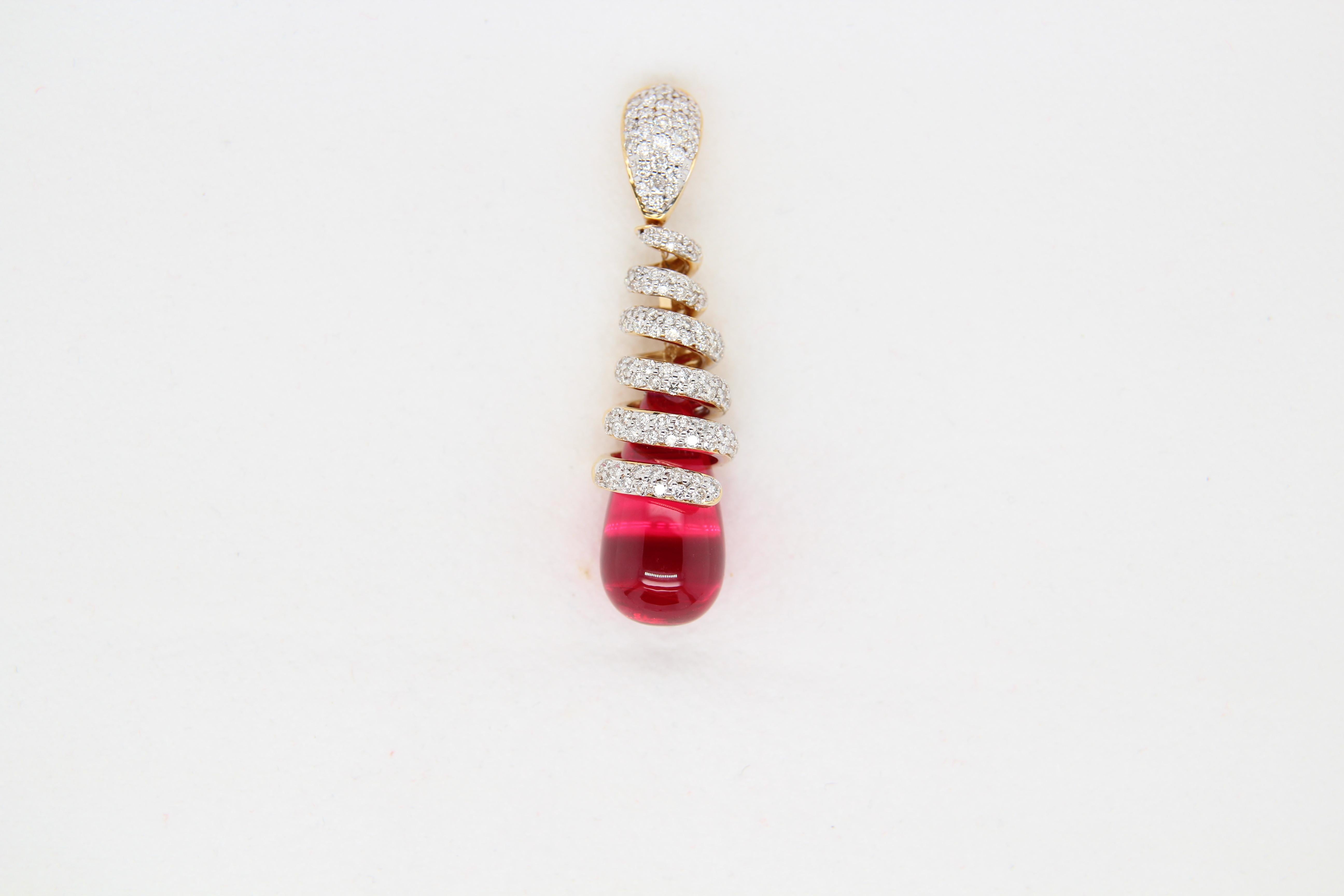 A brand new diamond and glass filled ruby pendant in 18 karat gold. The total diamond weighs 1.12 carat and glass filled ruby weighs 12.50 carat. The total weight of pendant is 11.01 grams. The pendant does not include a chain.