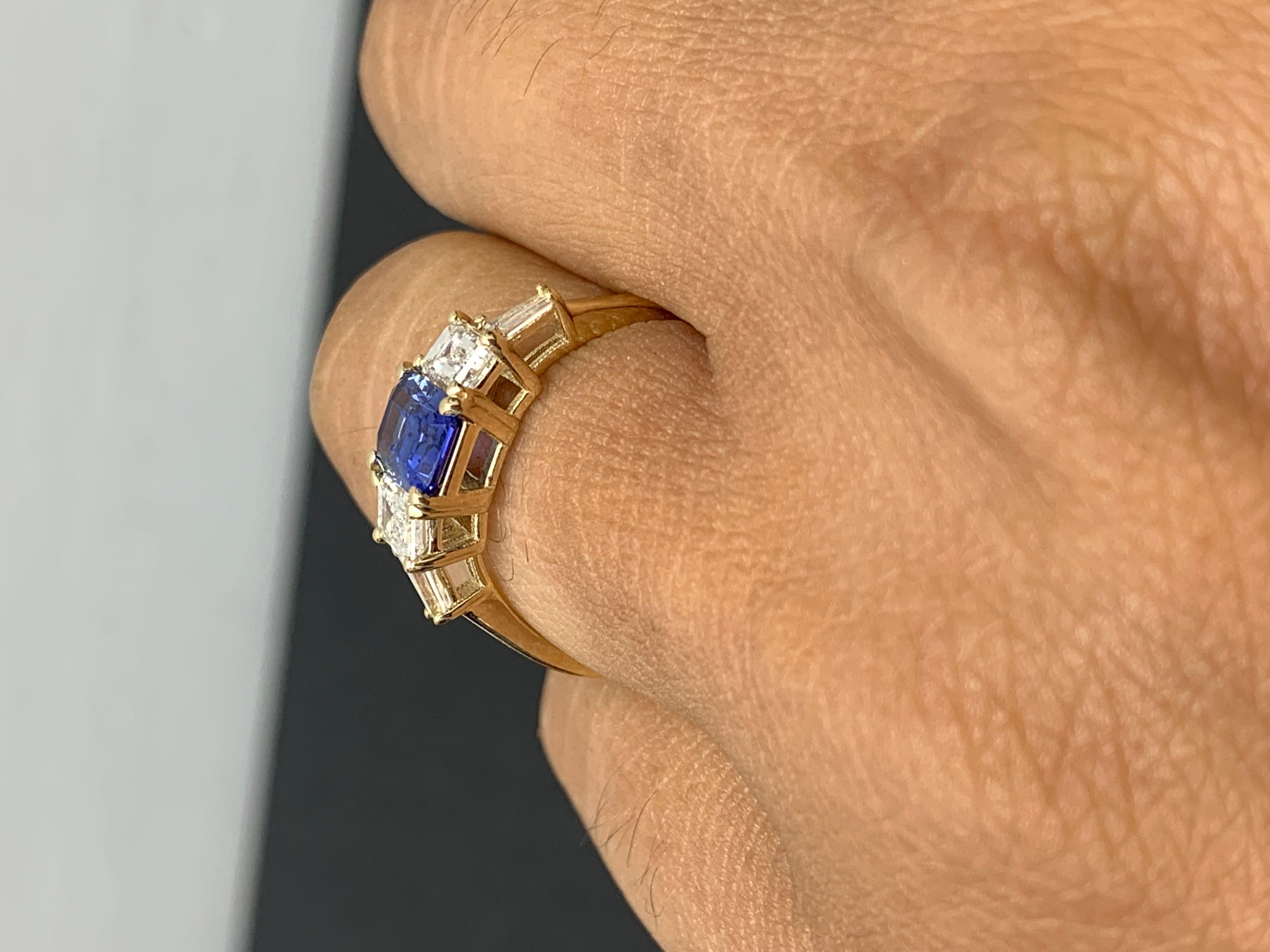 1.12 Carat Emerald Cut Blue Sapphire and Diamond 5 Stone Ring in 14K Yellow Gold In New Condition For Sale In NEW YORK, NY