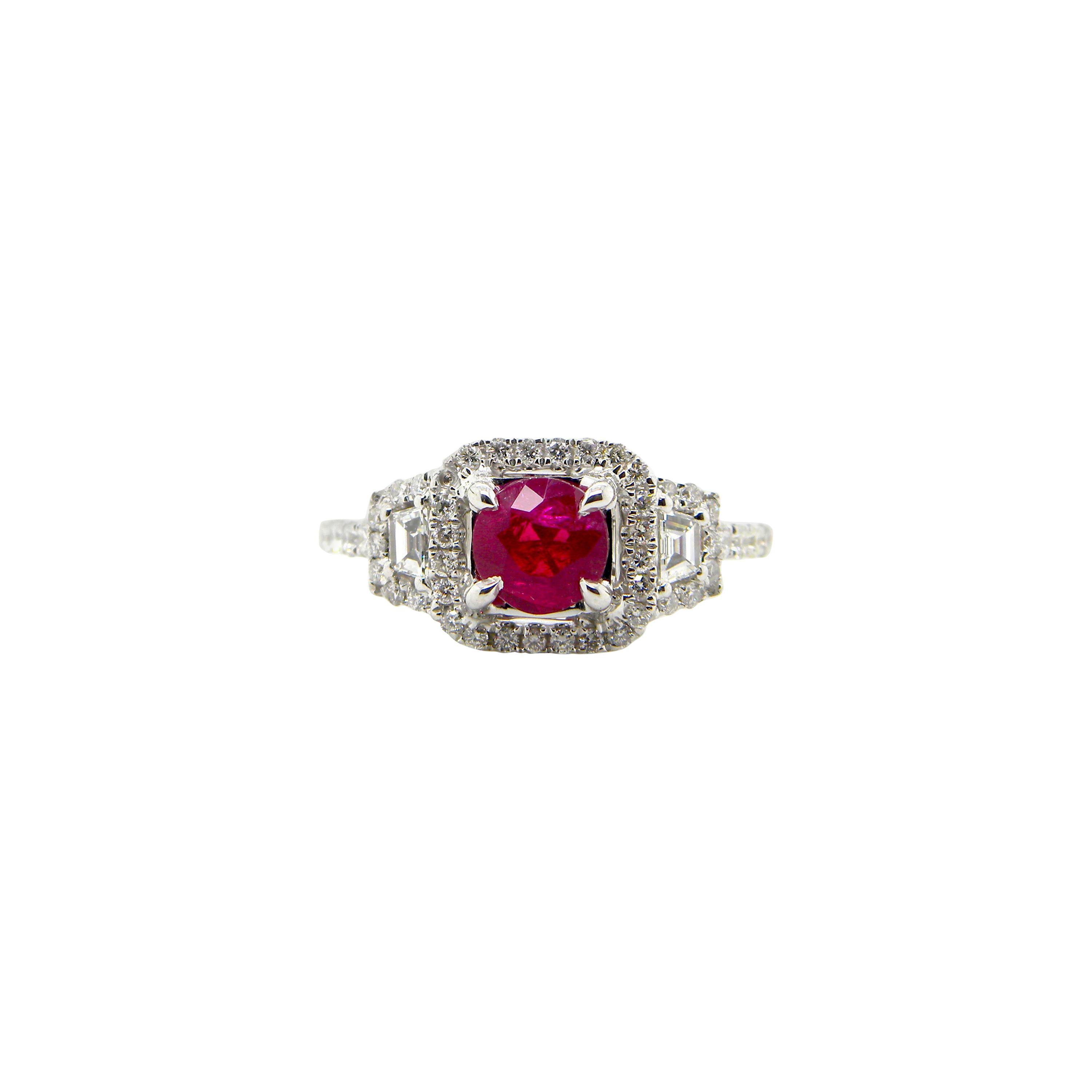1.12 Carat GIA Certified Unheated Vivid Red Burmese Ruby and Diamond Gold Ring:

An incredibly rare ring, it features a 1.12 carat GIA certified unheated pigeon's blood red round-cut Burmese ruby with two white baguette diamonds on the sides