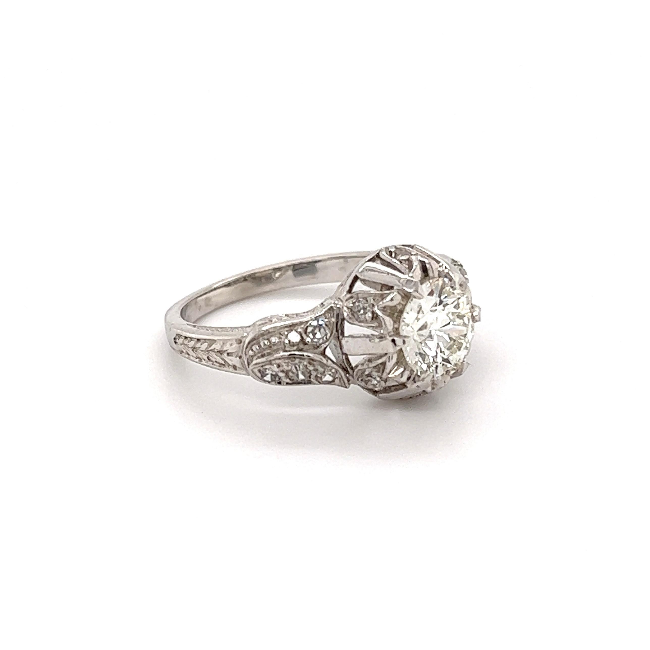 Simply Beautiful! Finely detailed Diamond Solitaire Platinum Ring. Centering a securely nestled GIA Old European Cut Diamond, weighing approx. 1.12 Carats, GIA #2195881235; J-VS2. Accented by Diamonds weighing approx. 0.18tcw. Approx. dimensions: