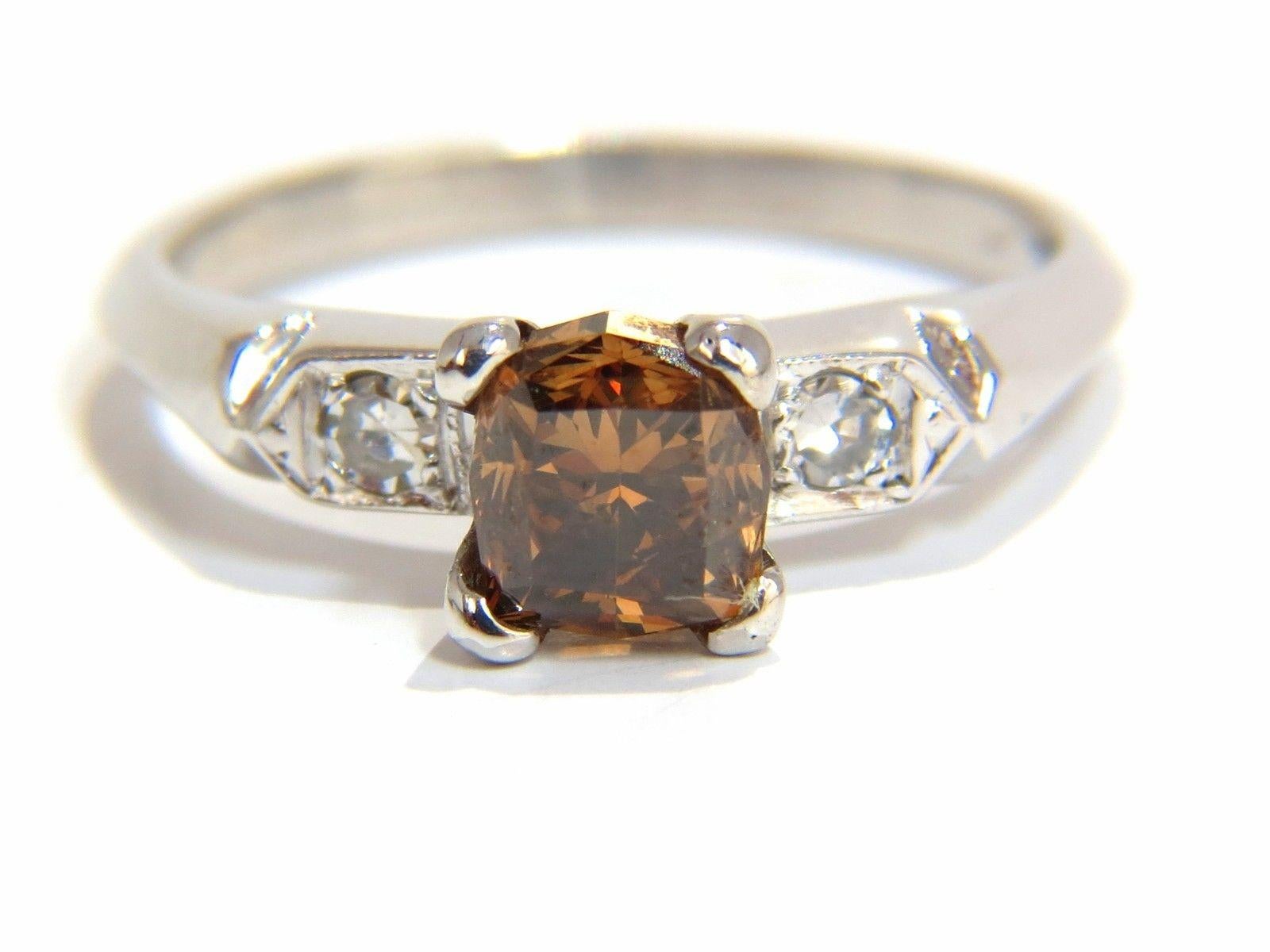 Natural Fancy Color & Edwardian Deco

1.02ct. Center Square Cut Cushion Diamond

5.5 X 5.1mm

Vs-2 clarity

Brown Orange color

Excellent Brilliance.



.10ct. Round, full cut Baguettes.

H Color Vs-2 clarity.

Platinum 

3.8 grams.

current ring