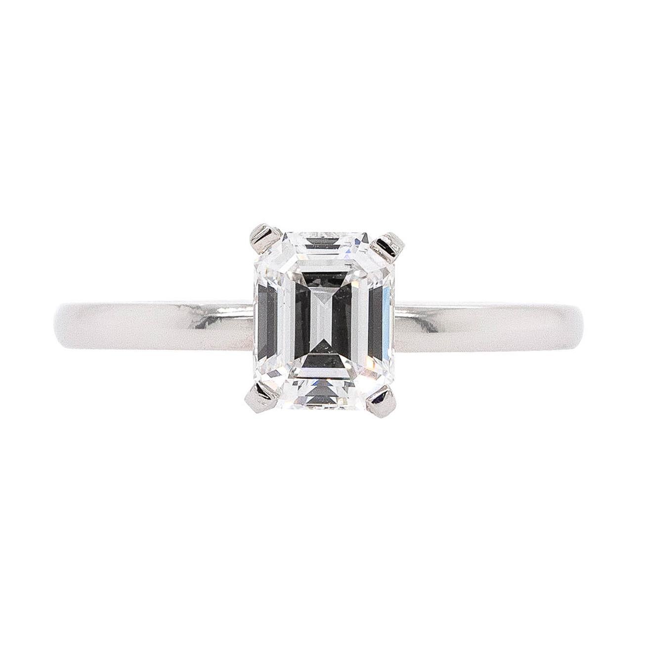 Center Details: 
1.12ct Natural GIA Emerald Cut Diamond that is D in color and VS2 in clarity
GIA Report # 6213072127
6.78 x 5.37 x 3.63 mm
Polish: Very Good
Symmetry: Very Good
Fluorescence: None

Ring Material: Platinum

Ring Details: This smooth