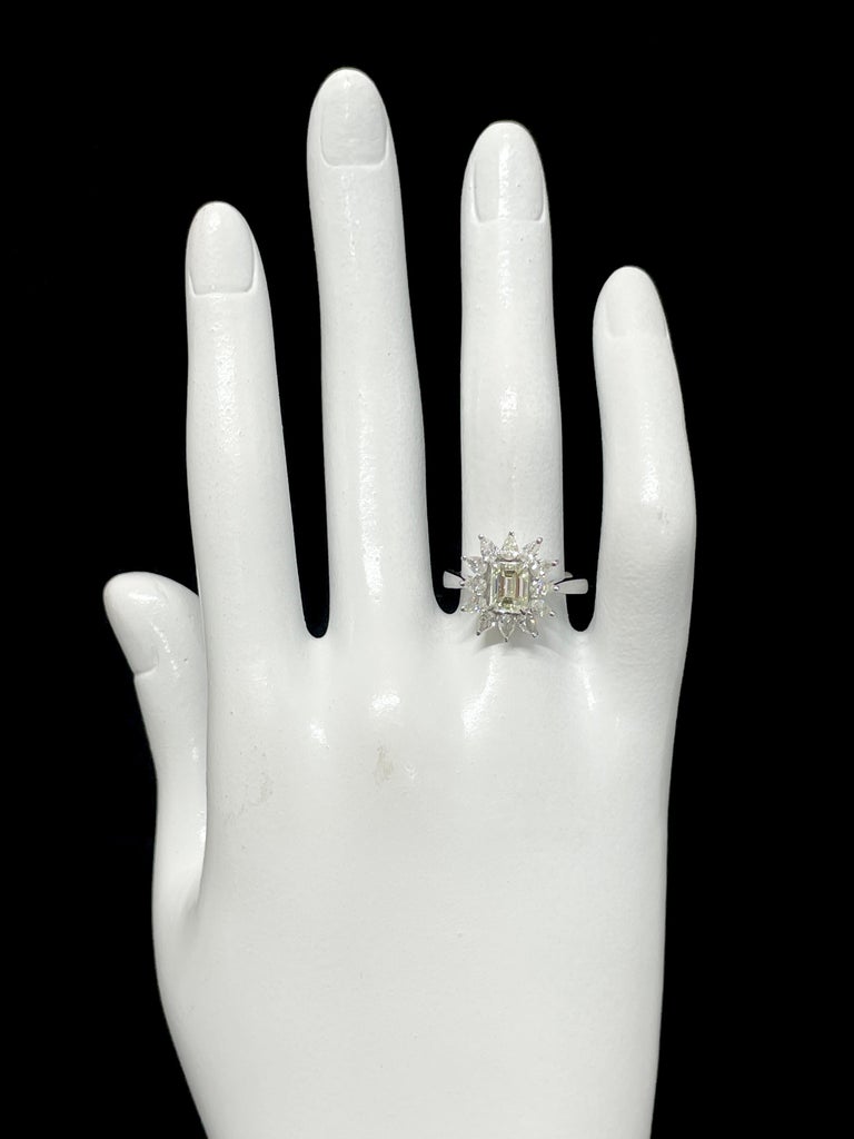 1.12 Carat Natural Very Light Yellow Diamond Halo Ring Set in Platinum