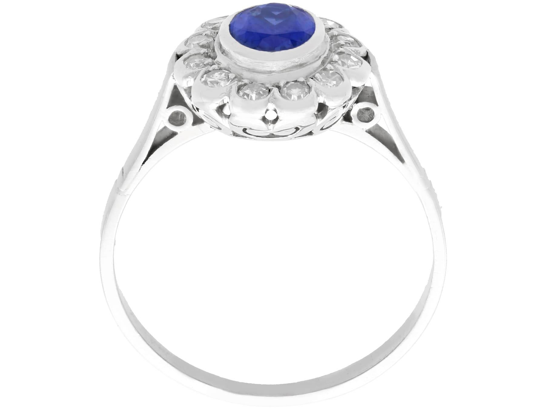 1.12 Carat Oval Cut Sapphire and Diamond Platinum Cluster Ring Circa 1930 For Sale 1