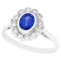 Vintage 1.12 Carat Oval Cut Sapphire and Diamond Platinum Cluster Ring Circa 1930