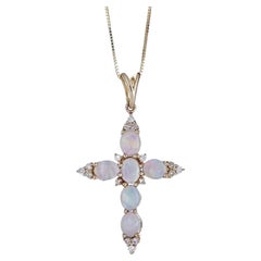 1.12 Carat Round-Cab Ethiopian Opal with Diamond Accents 14K Yellow Gold Pendant