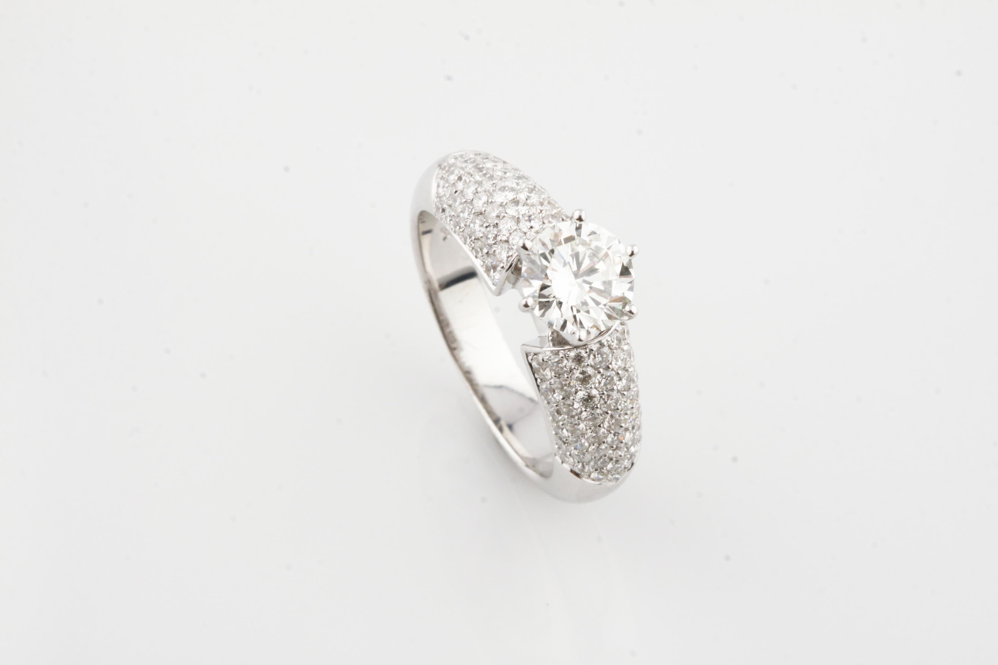 Modern 1.12 Carat Round Diamond Solitaire Ring with Pave Accents in White Gold For Sale
