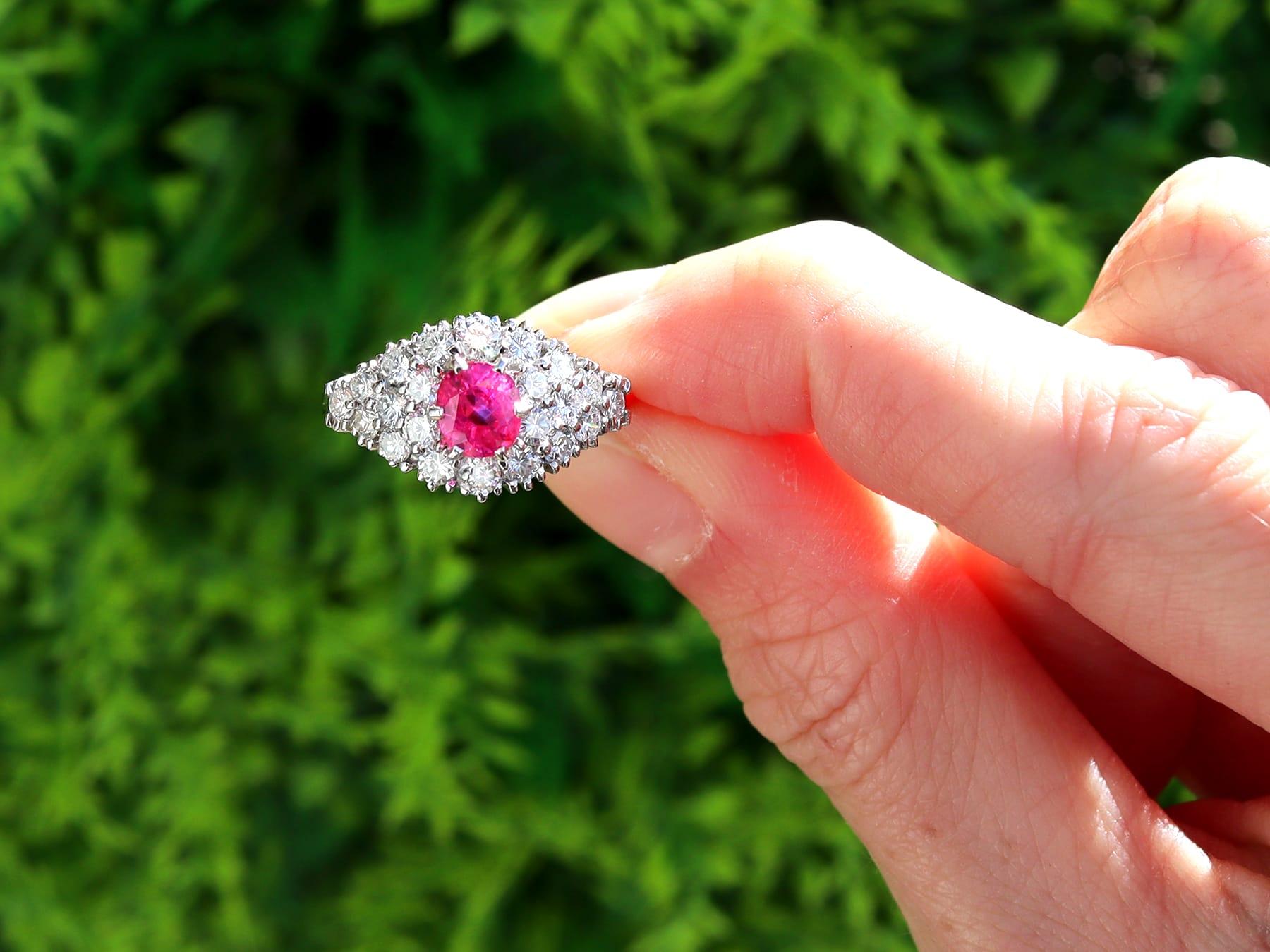 A stunning, fine and impressive vintage 1.12 carat ruby and 1.33 carat diamond, 18 karat white gold dress ring; part of our varied range of vintage ruby rings.

This stunning, fine and impressive vintage ruby cluster ring has been crafted in 18k