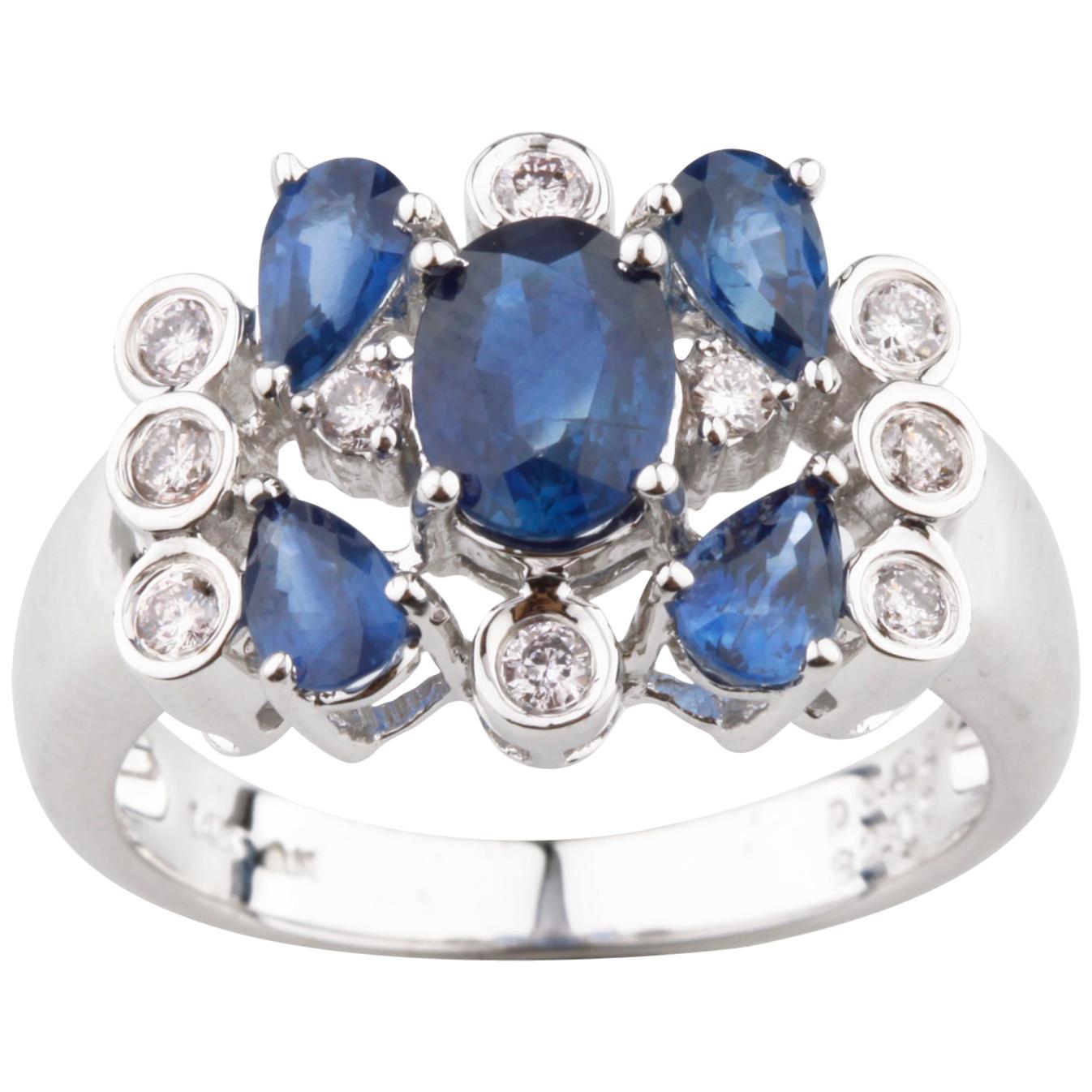 1.12 Carat Sapphire and Diamond Cluster Ring in White Gold For Sale