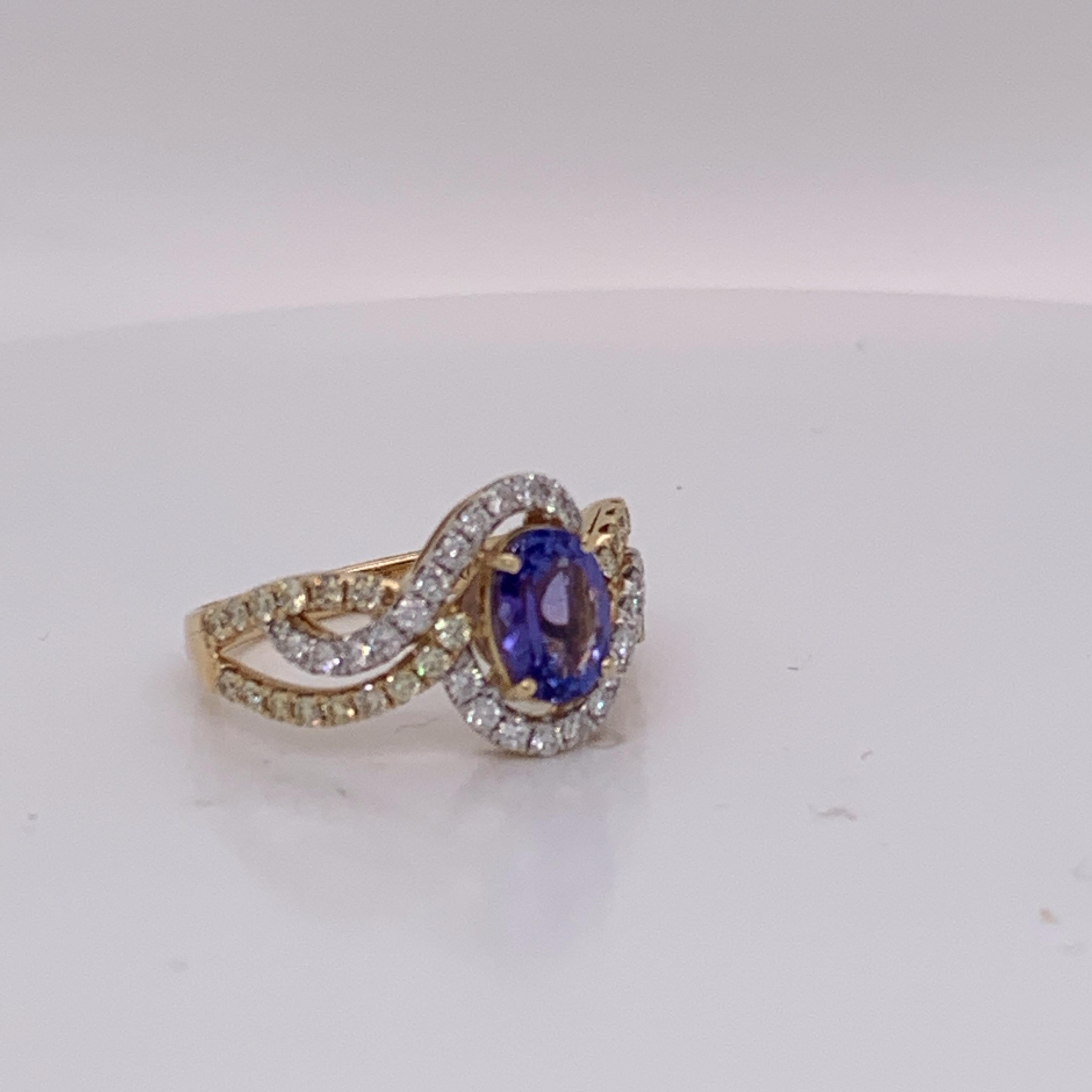 Oval Tanzanite Ring with yellow and white diamond. Crafted with hand in yellow gold.
Tanzanite: 1.12ct
Yellow Diamond: 0.37ct
White Diamond: 0.31ct
Yellow Gold: 14K
Ring Size: 7 (resizeable)