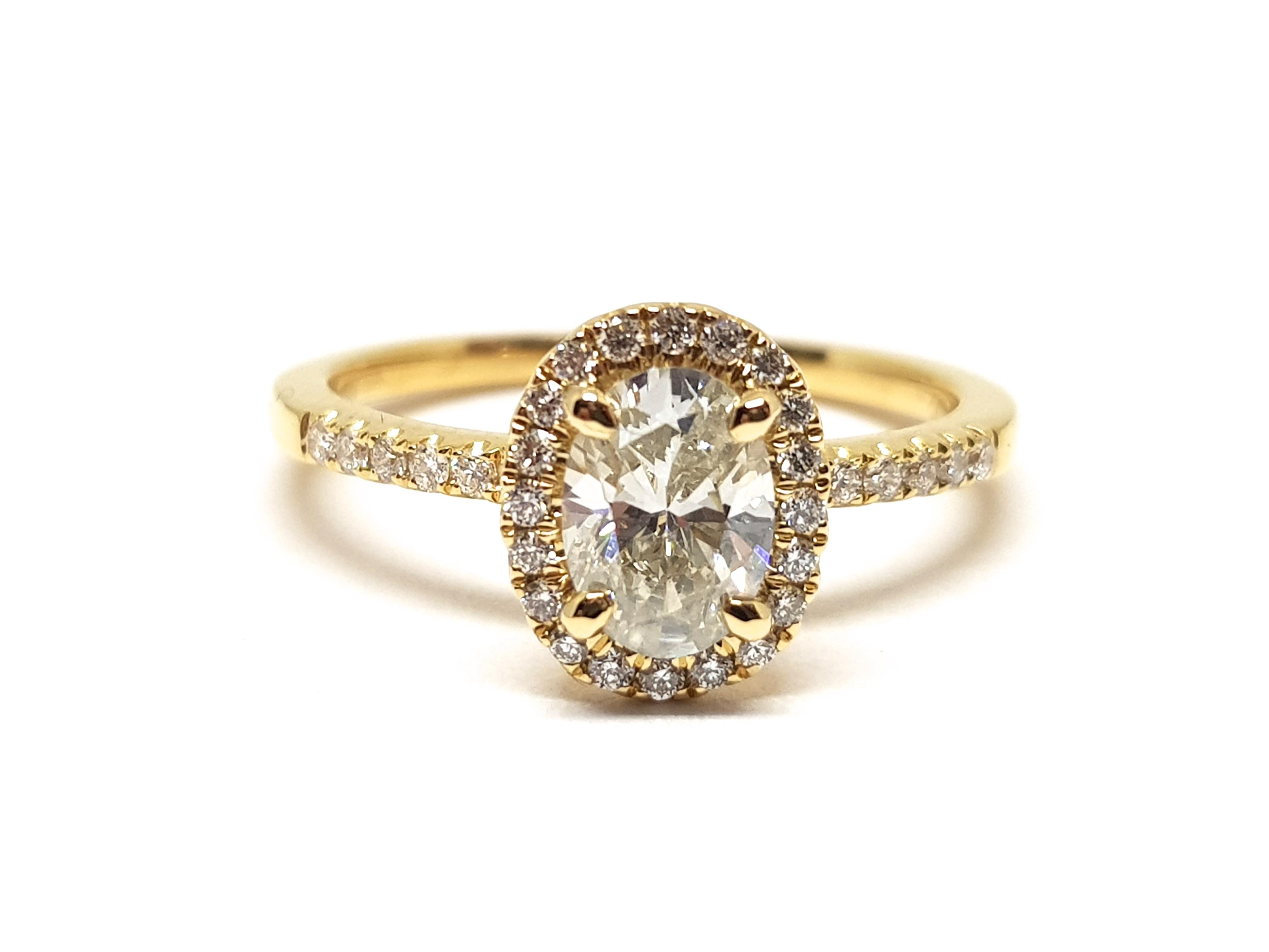 Gold: 18 Karat Yellow Gold 
Weight: 2.96gr. 
Central Diamond: 0.80 ct. Colour: I clarity: VS1 
Accent Diamonds: 0.32 ct. Colour: F clarity: VS1 
Width: 1.0 cm. 
Ring size: 53 / 17.00mm 
Free resizing of Ring up to size 70 / 22mm / US 13 
All our