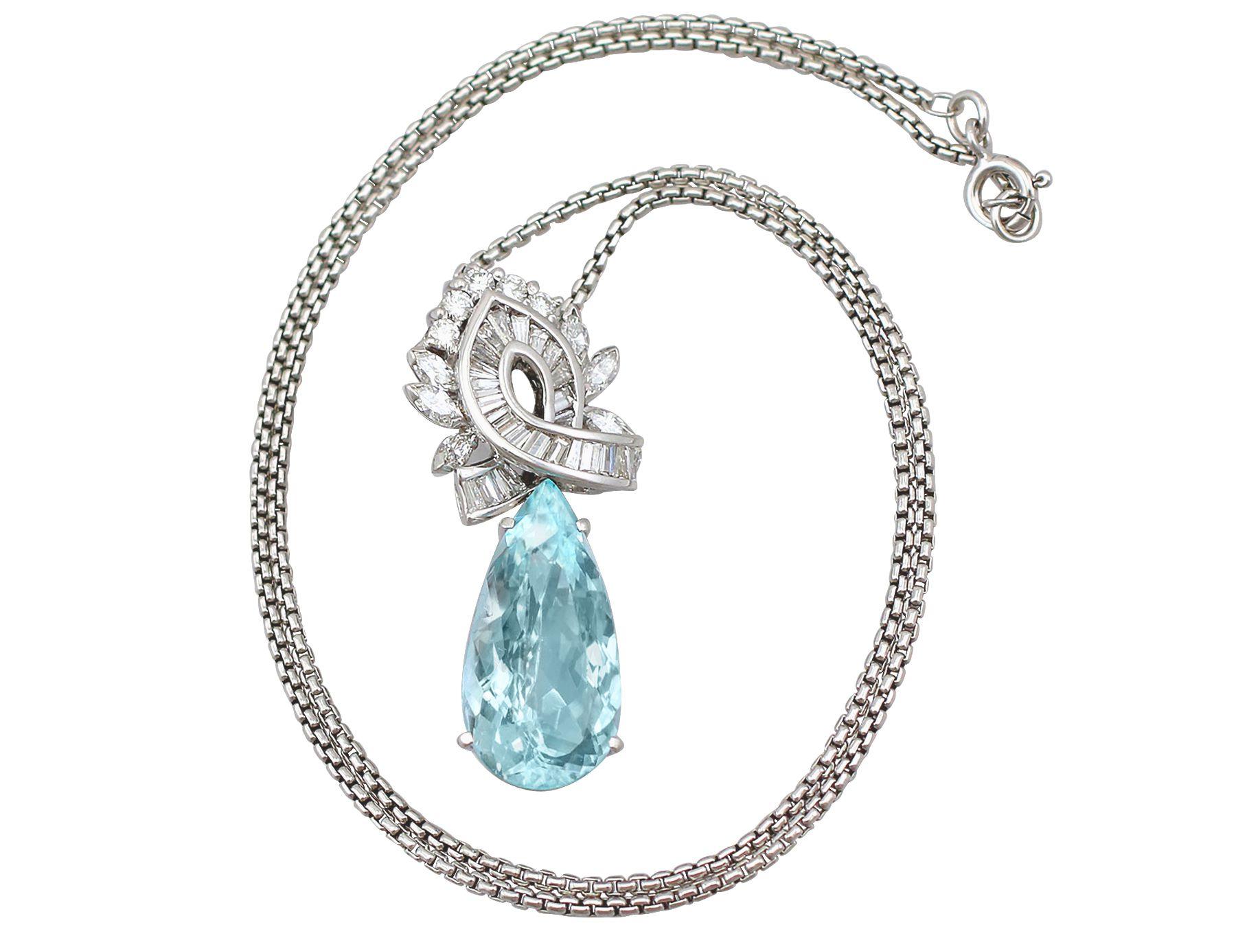 A stunning vintage 11.20 carat aquamarine and 2.37 carat diamond, 18 karat white gold and platinum pendant; part of our diverse diamond jewelry and estate jewelry collections.

This stunning, fine and impressive vintage aquamarine pendant has been